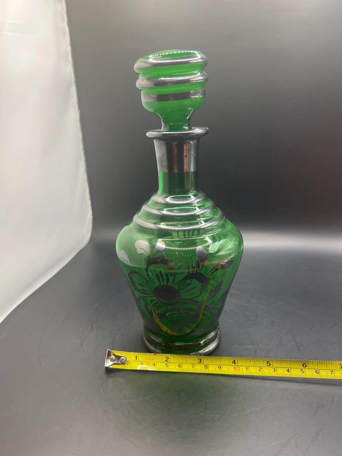 Antique Art Nouveau Emerald Green Glass Decanter with floral silver overlay and original stopper.