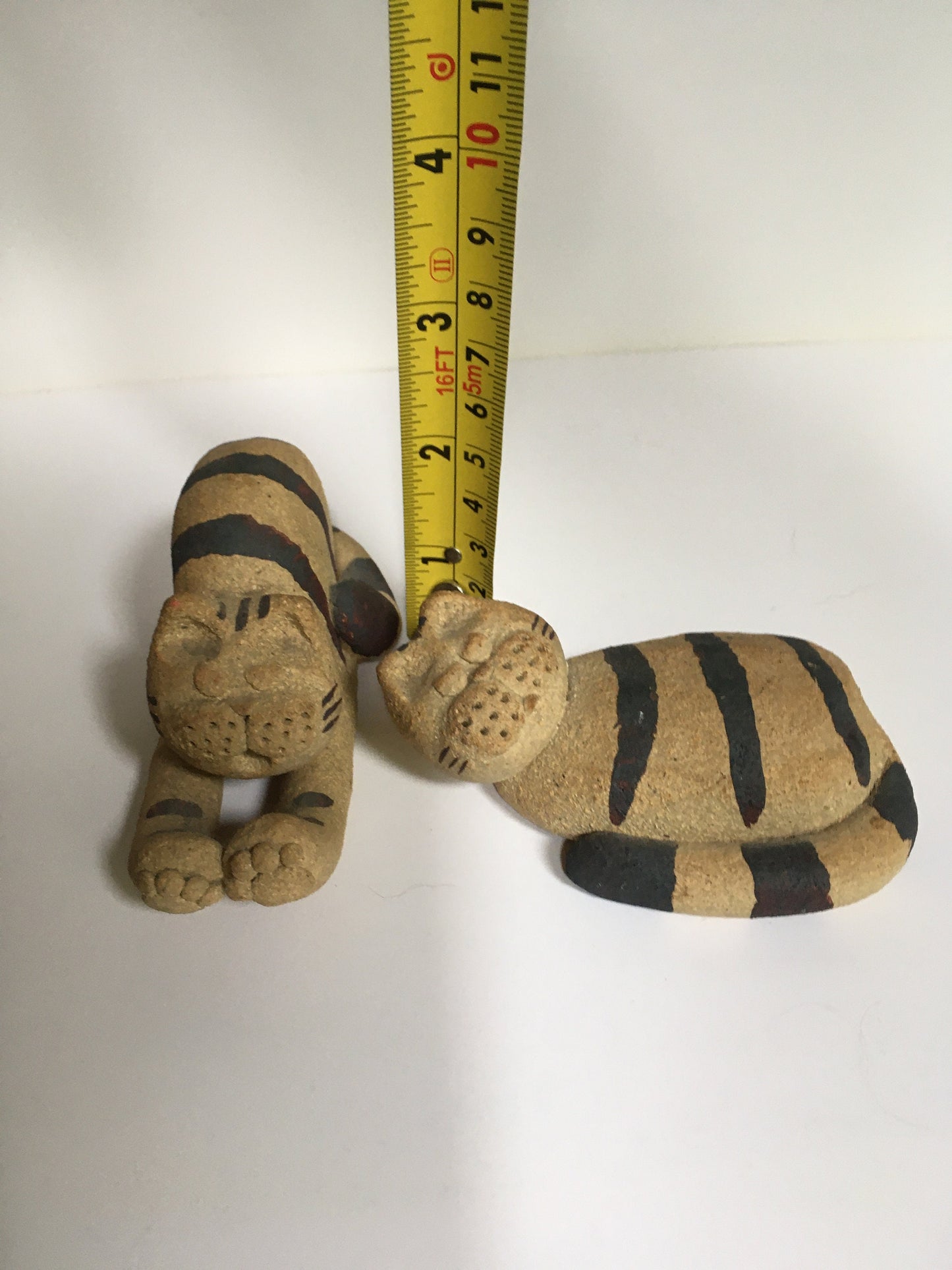 Cat figurines.