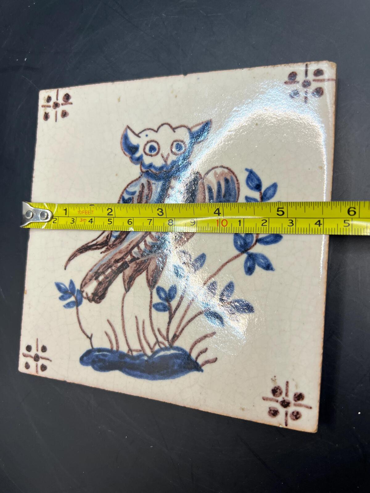 Antique Dutch Delft polychrome tile. Hand-painted owl with foliage.