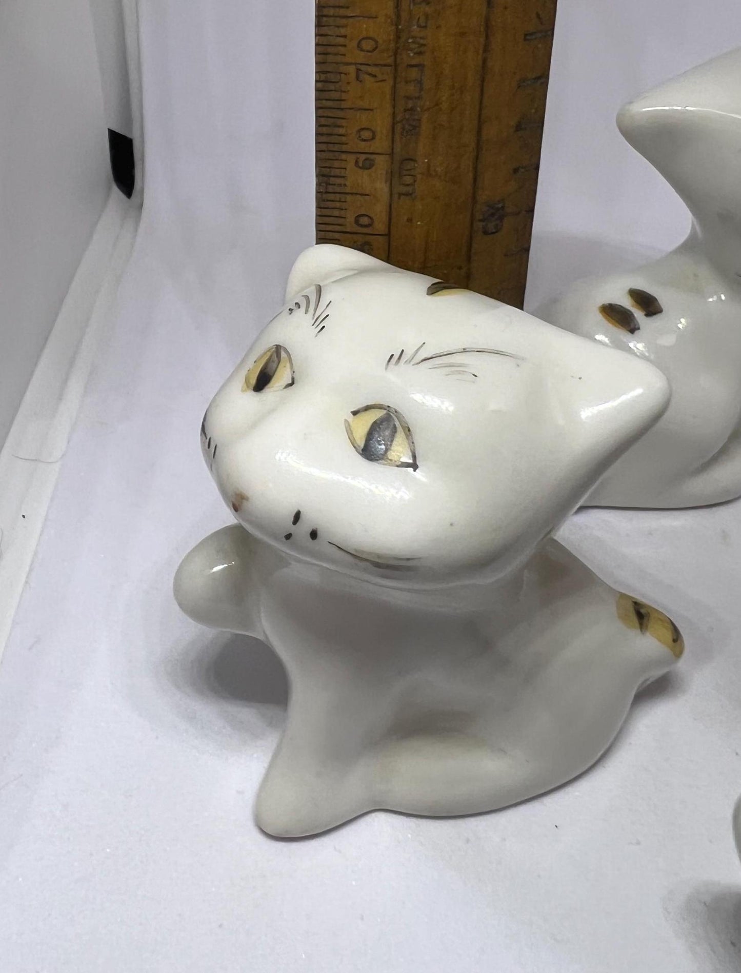 Cat family figurines. Ceramic cat ornaments