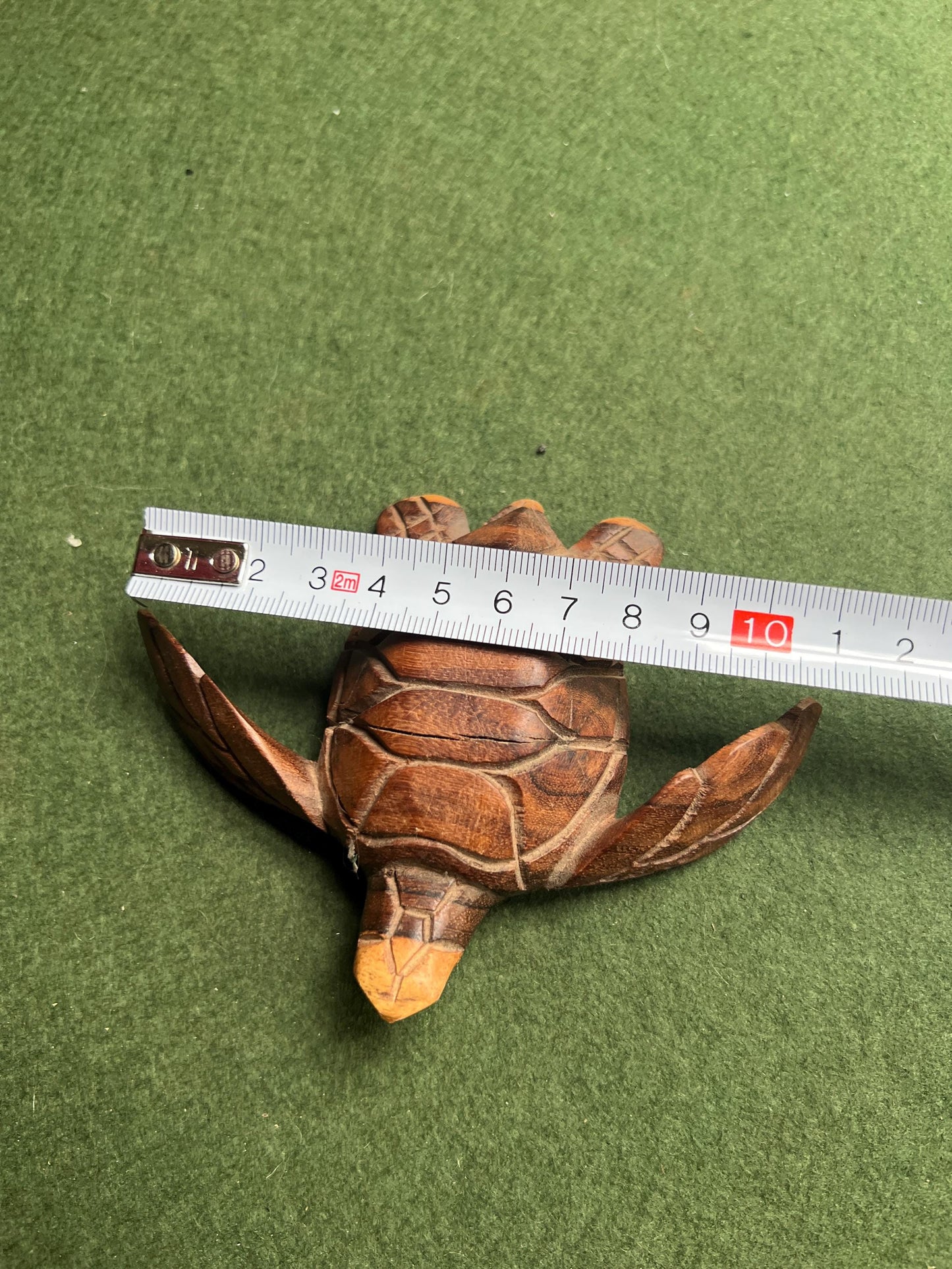 Hand carved Monkey wood swimming turtle figure.