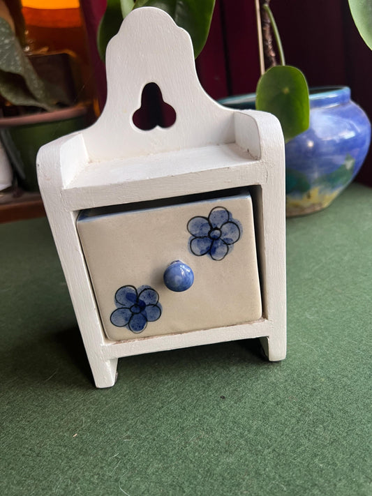 Vintage ceramic wood spice salt drawer in wooden wall hanger.