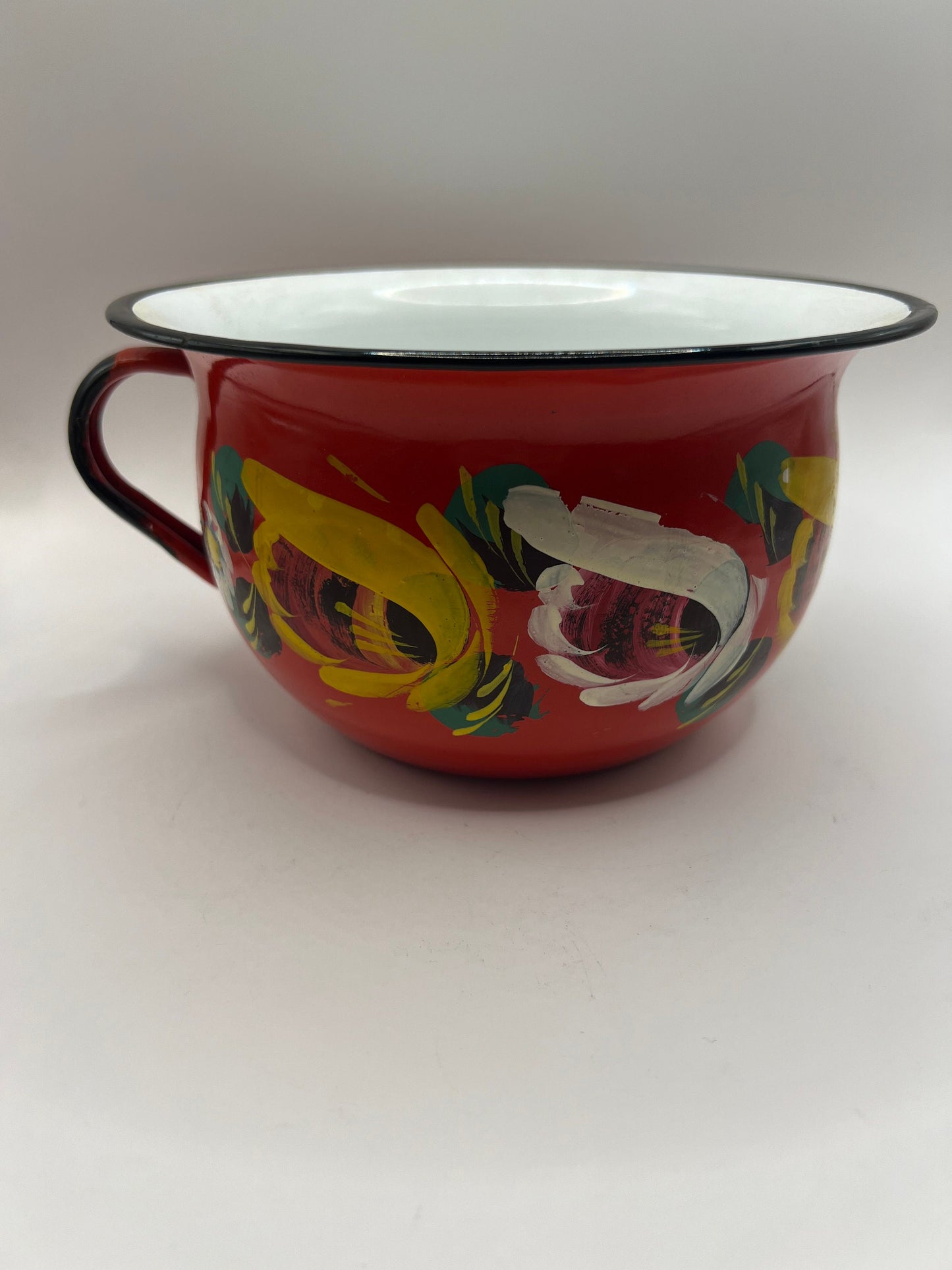Polish enamelware chamber pot planter.