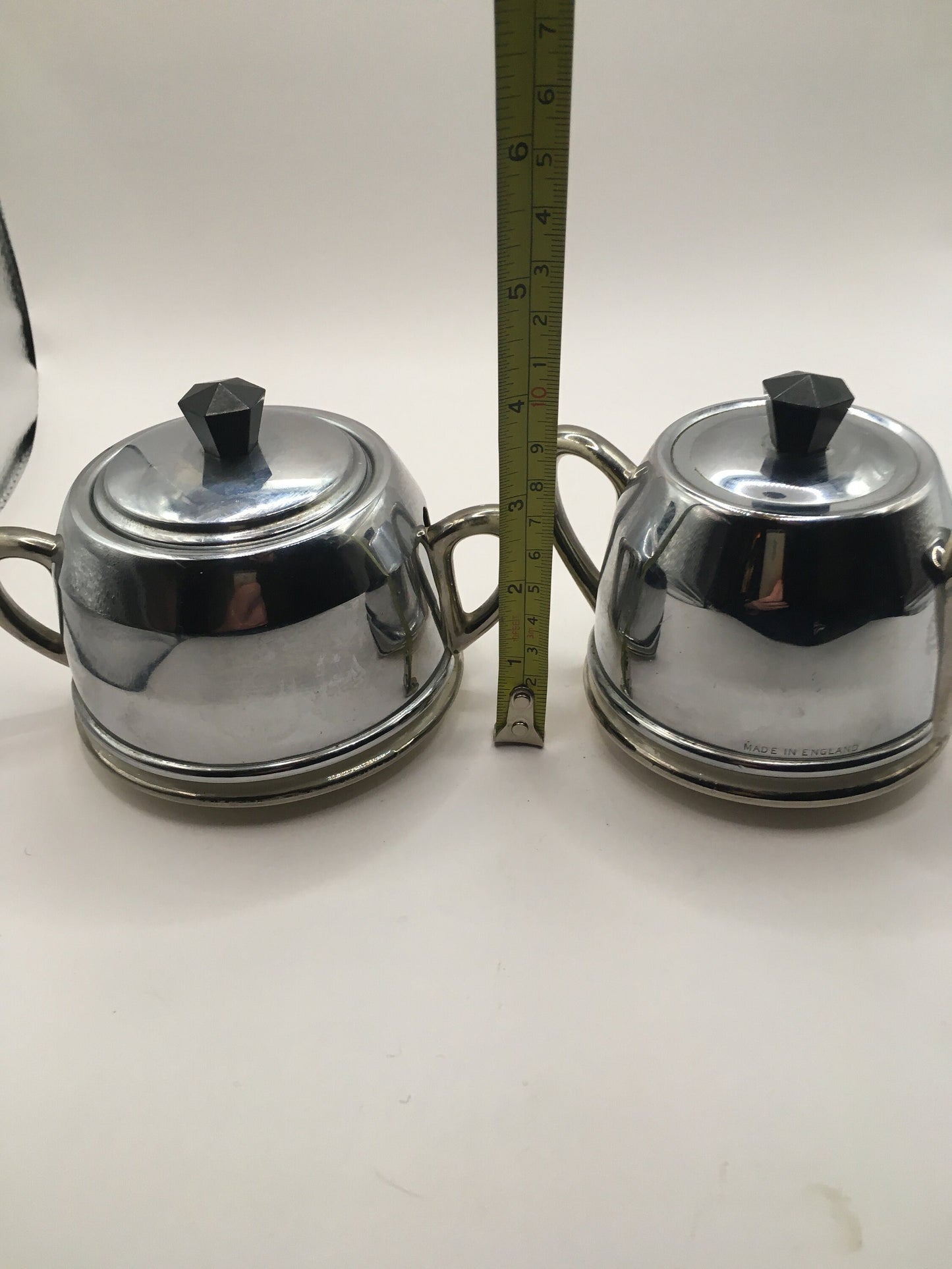 Vintage ceramic and metal insulated creamer and covered sugar bowl.