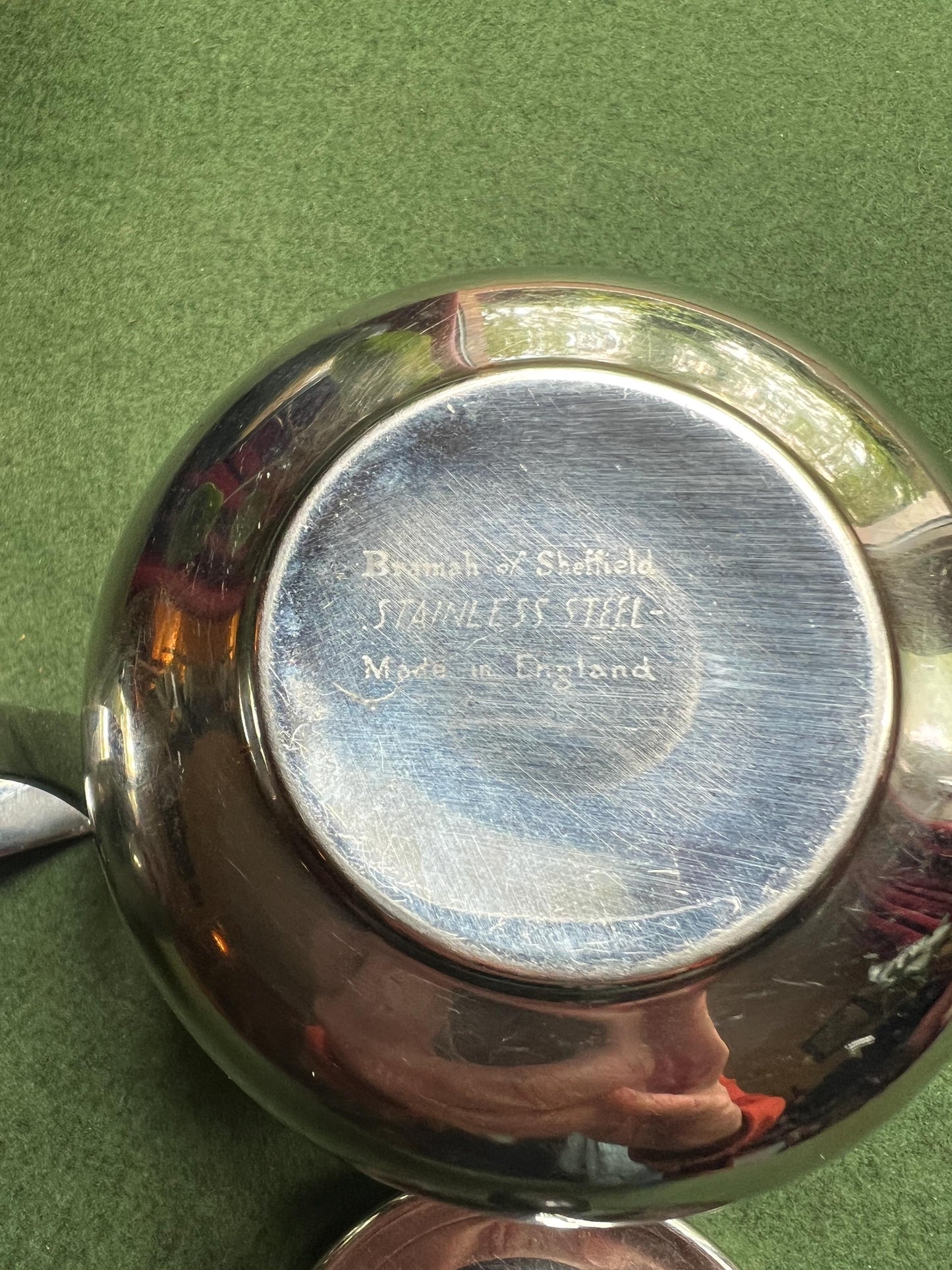 Stainless Steele lidded sugar bowl and creamer. Stamped Bramah of Sheffield Made in England.