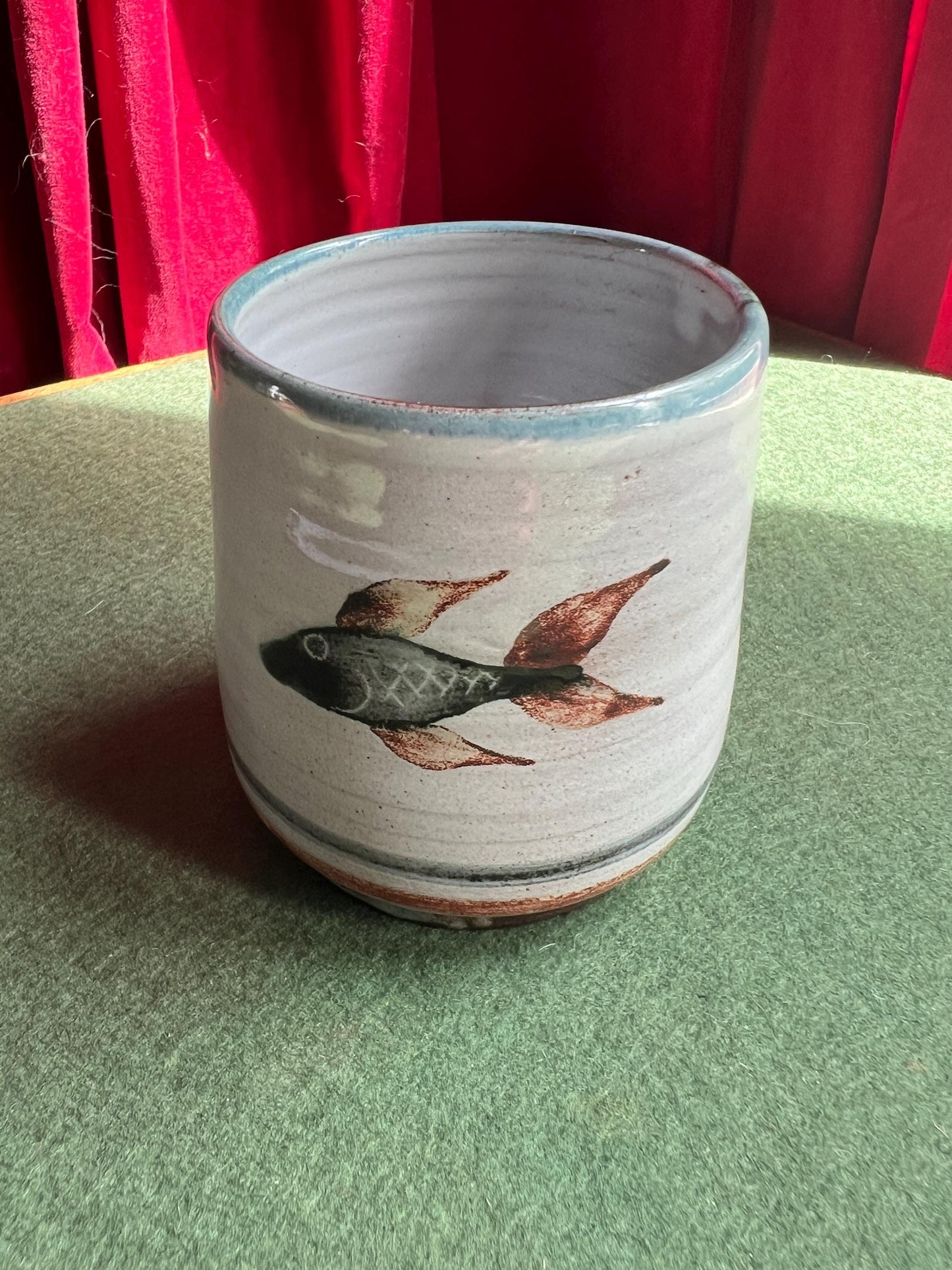Studio pottery beaker planter. Hand painted fish design Signed Lamorna pottery.