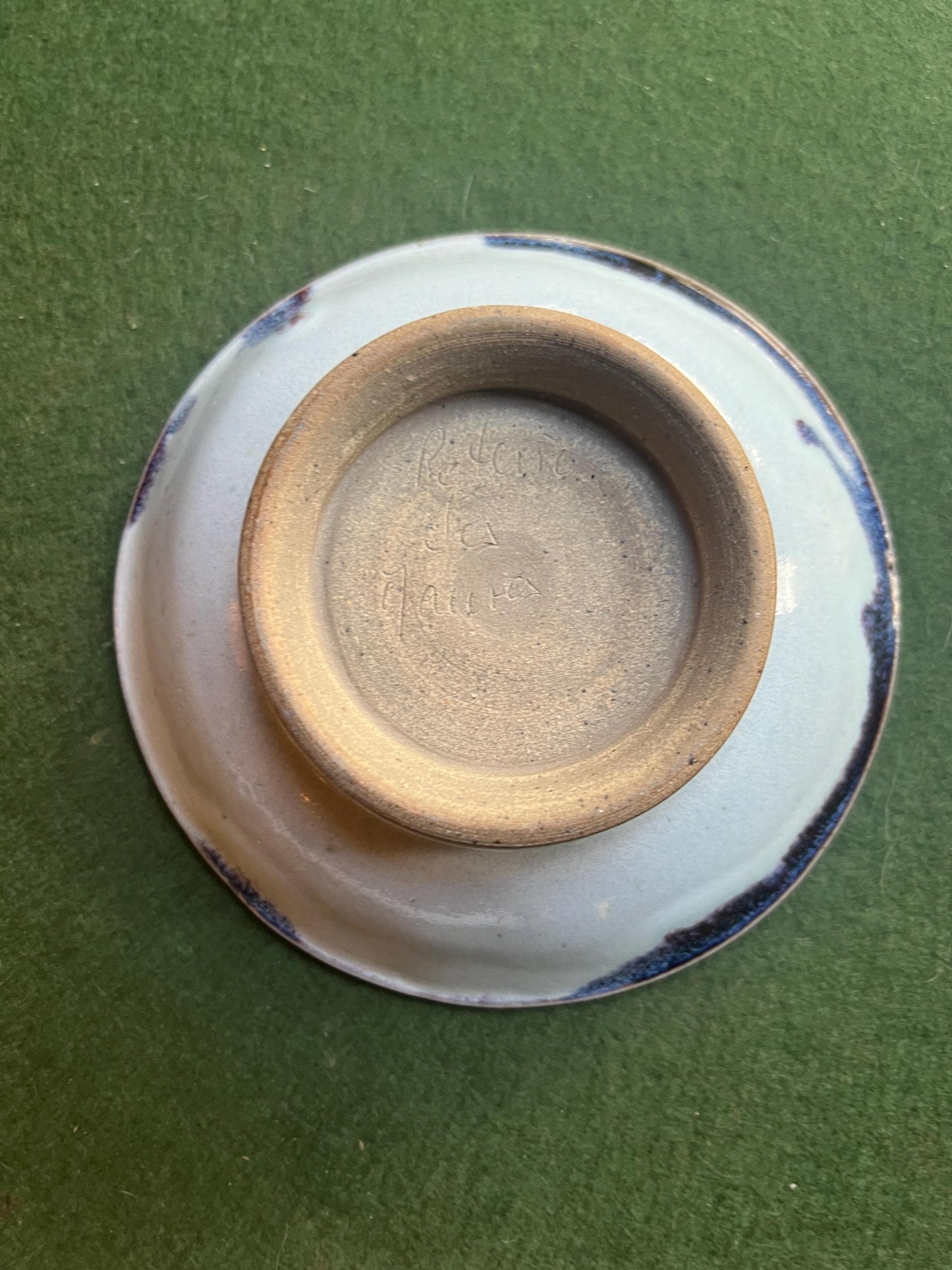 Studio pottery bowl. Hand thrown stone ware with blue white drip glaze. Signed footed bowl.