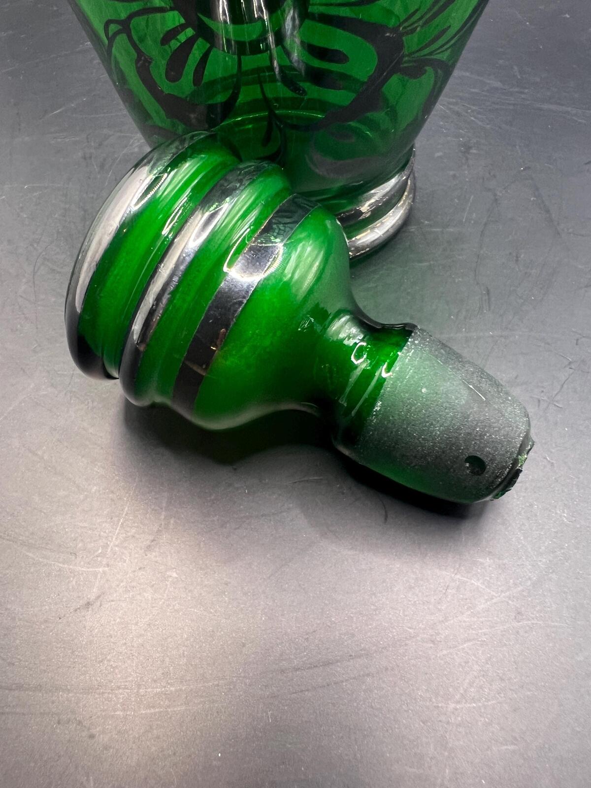 Antique Art Nouveau Emerald Green Glass Decanter with floral silver overlay and original stopper.