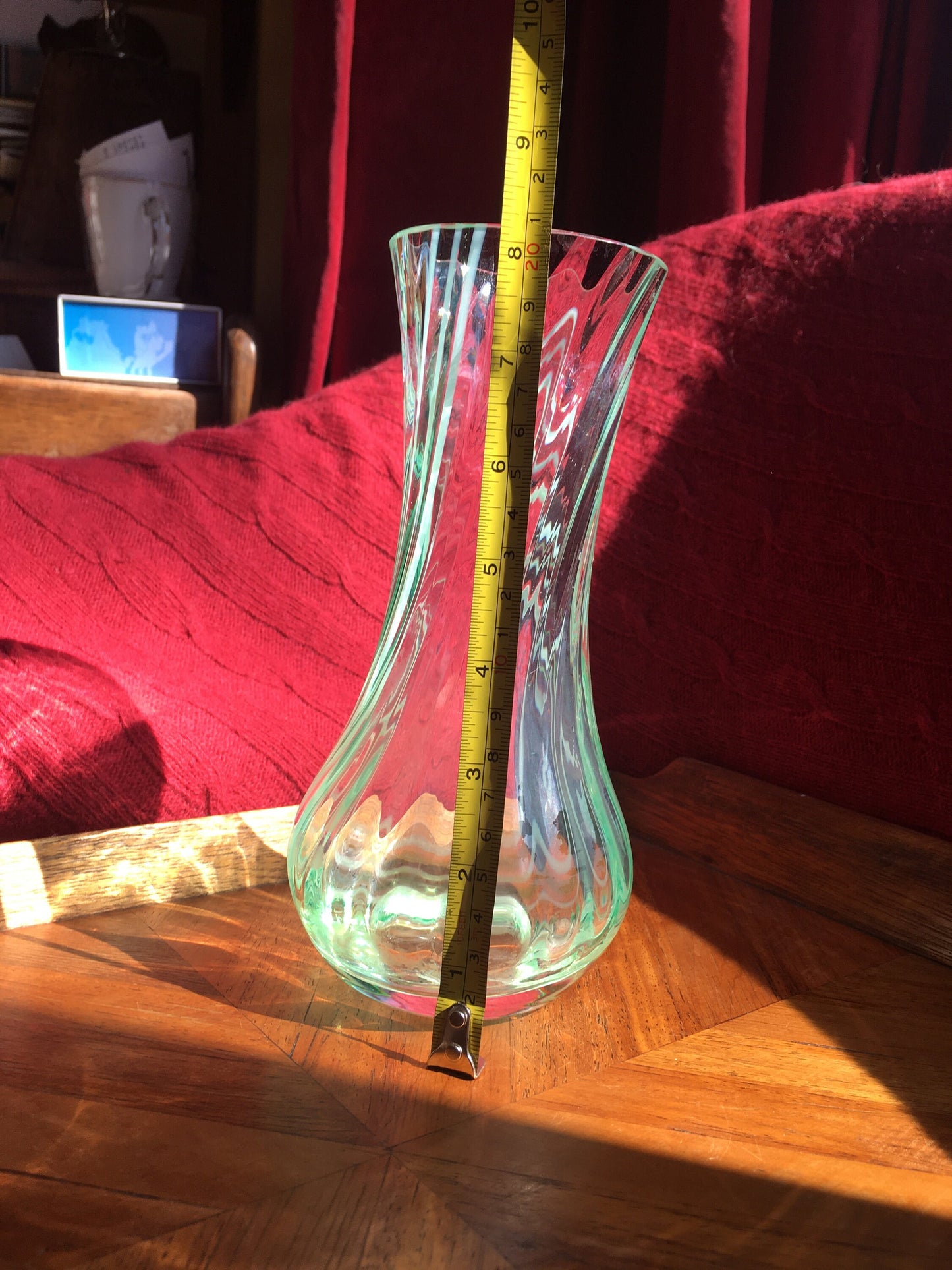 Beautiful vintage clear glass flower vase with green swirl detail. Heavy based.