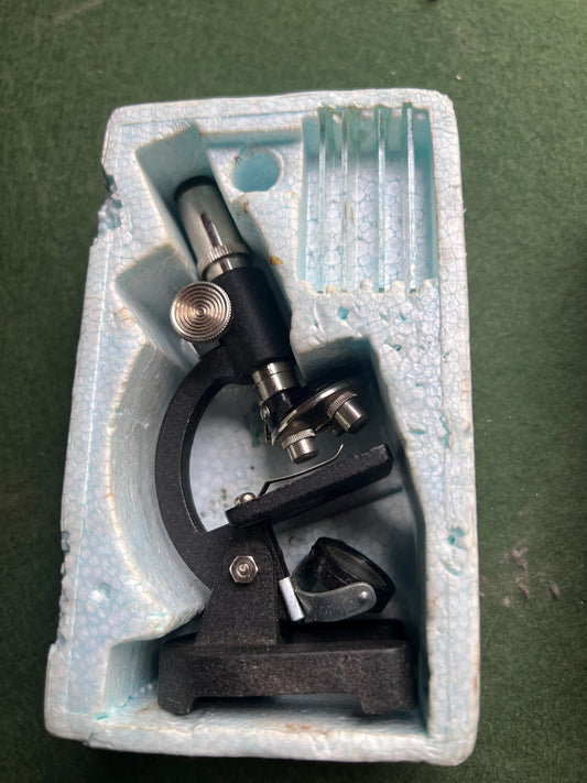 Vintage microscope 1950s Junior Toy microscope. Original box slides.