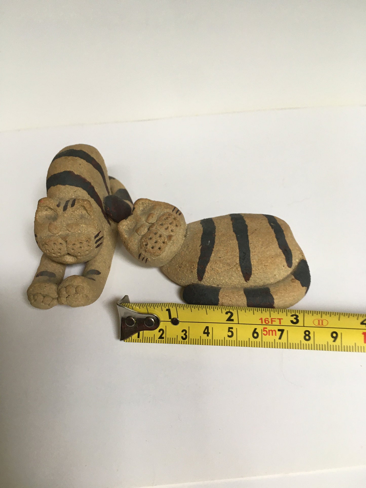 Cat figurines.