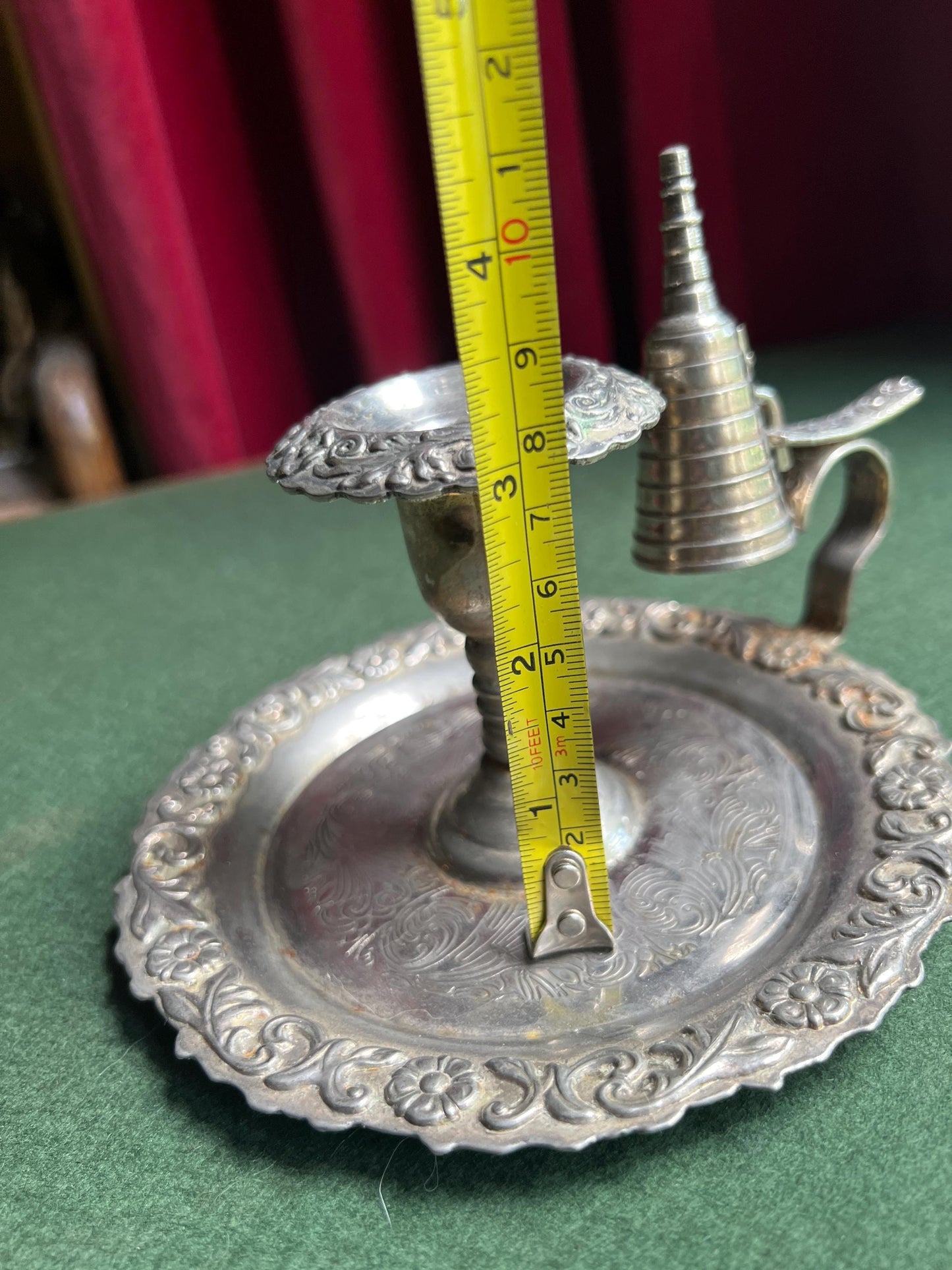 Vintage silver tone candle holder with snuffer.