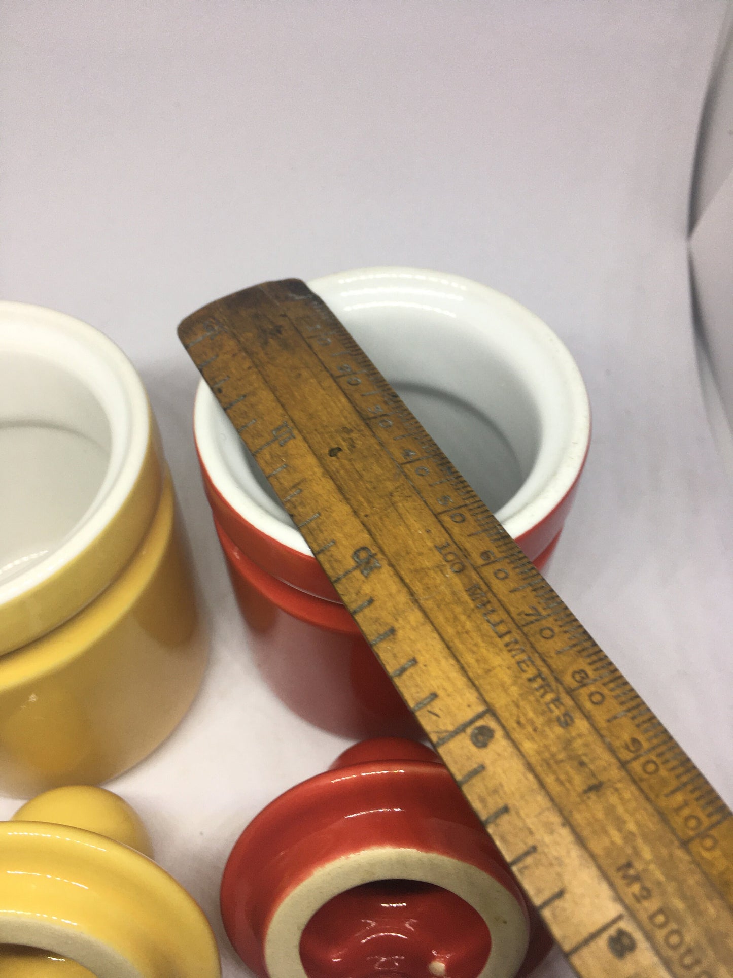 Ceramic lidded honey sugar pots. Vibrant red and yellow glazed set of vintage jam pots.