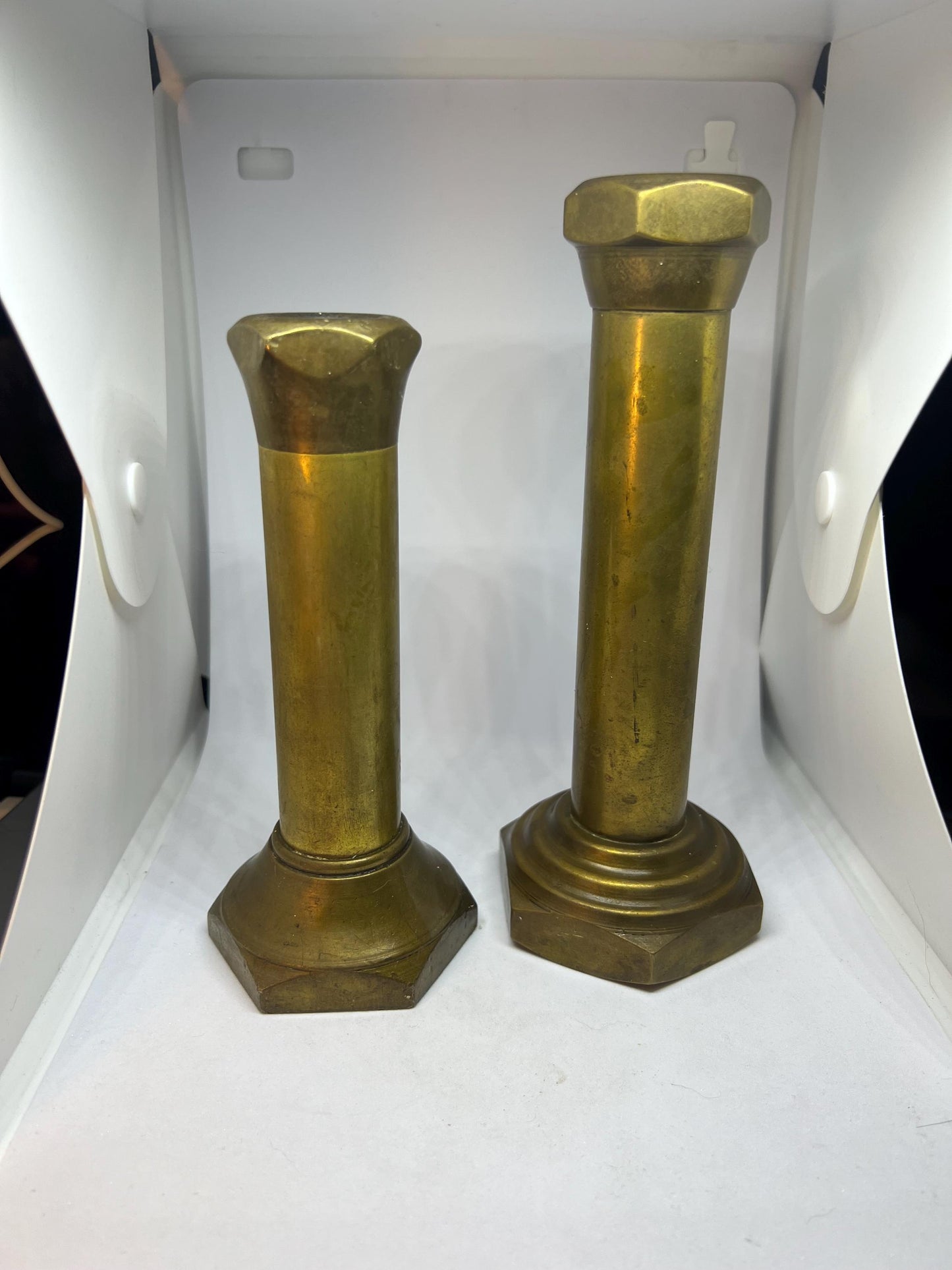 Steampunk style graduated candle holders.