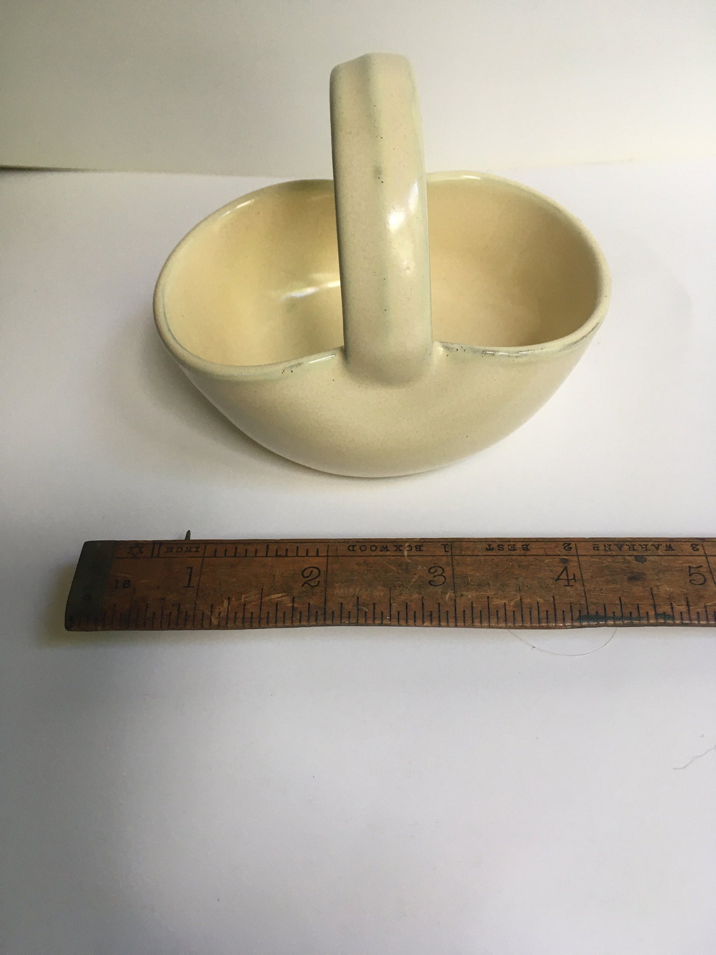 Denby pottery cream glazed basket.