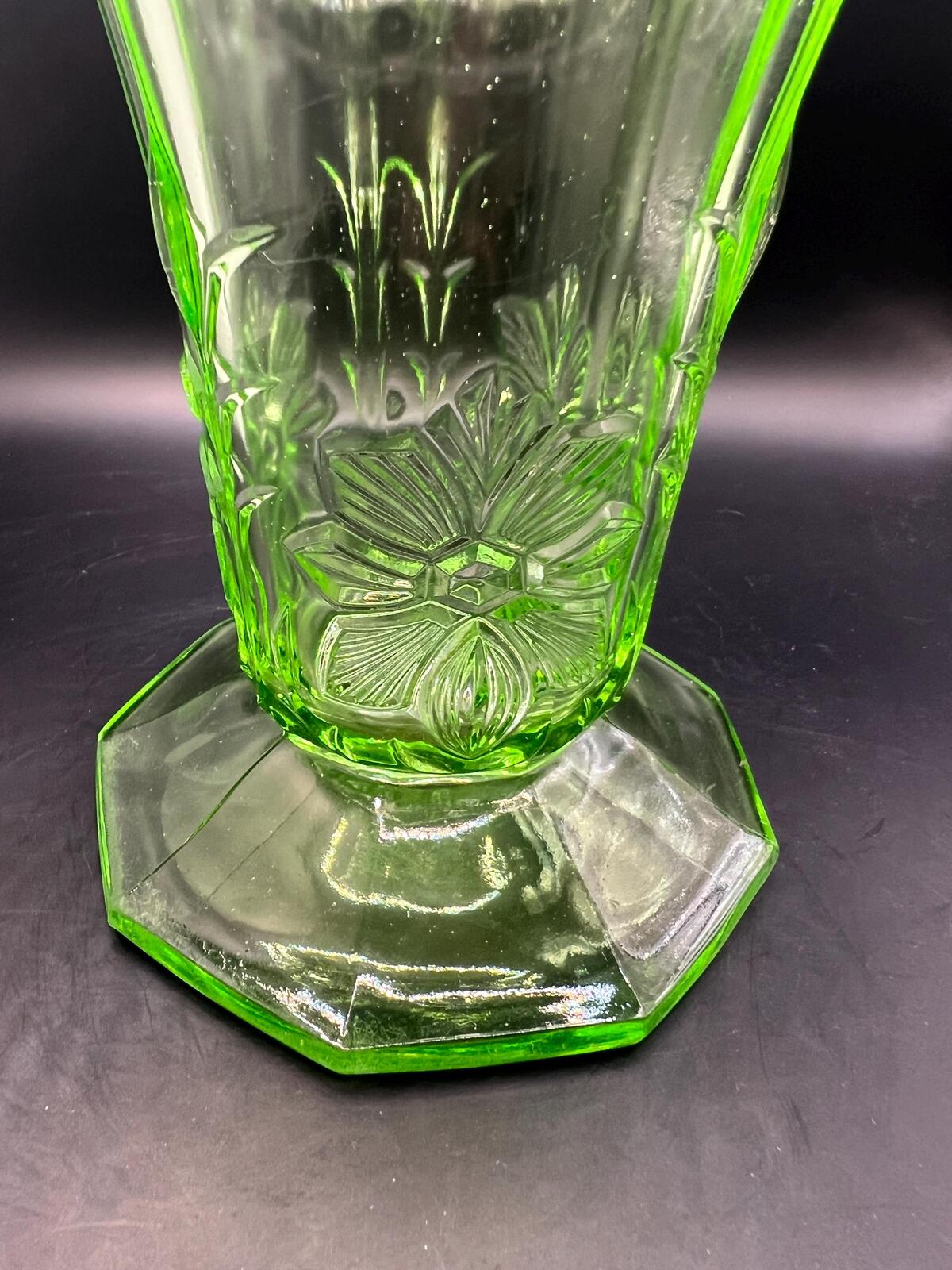 Vintage antique uranium glass vase. Octagonal base with flared ruffle rim and floral imprint.