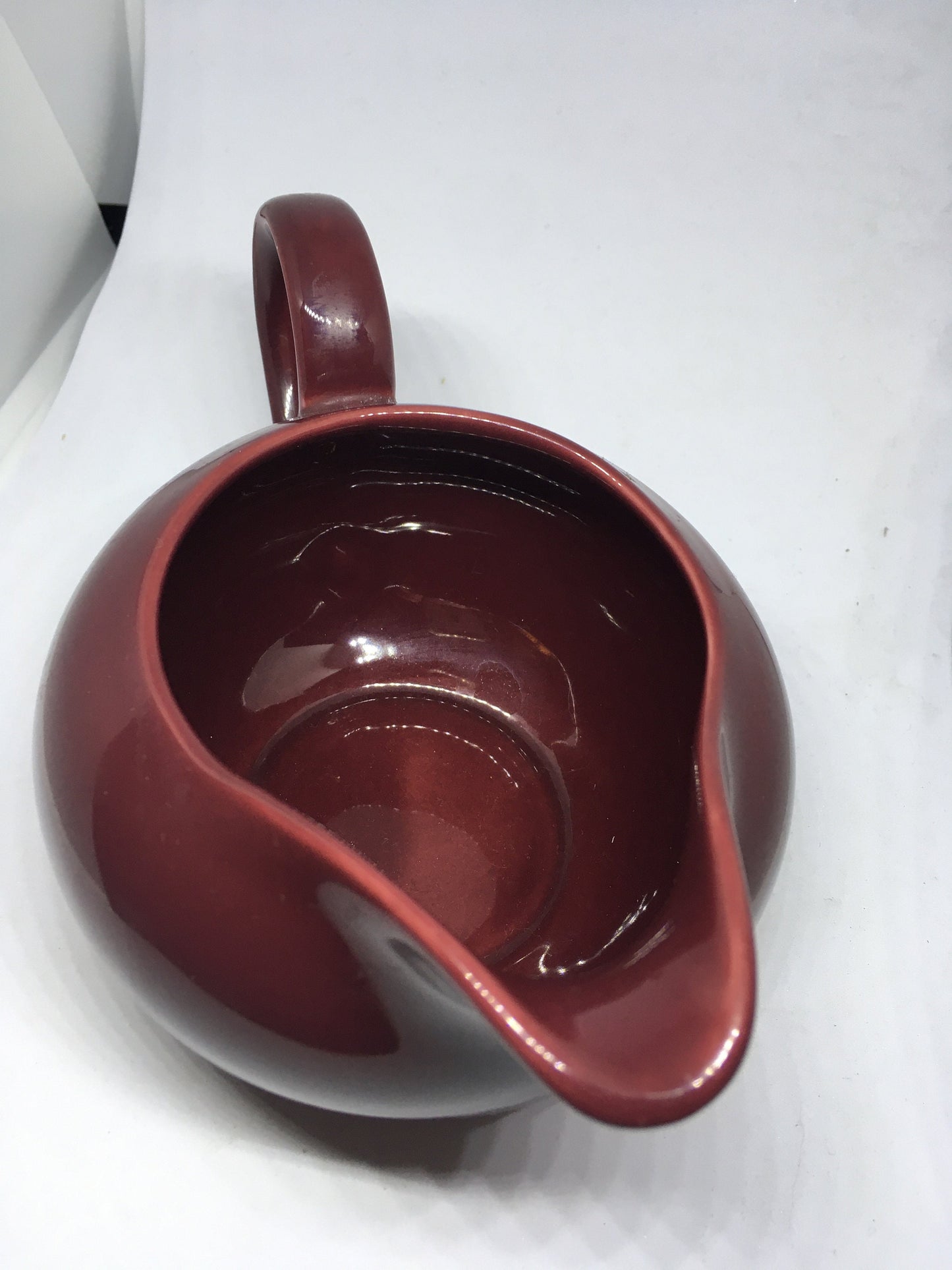 Rare vintage deep red Poole Pottery milk jug creamer sauce boat.