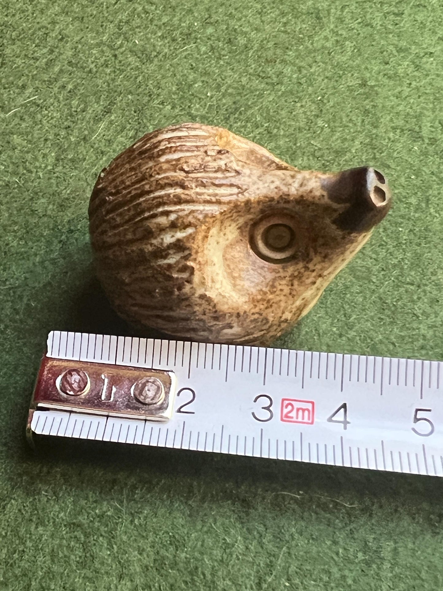 Miniature hedgehog figurine. 1970s Studio pottery hoglet ornament.