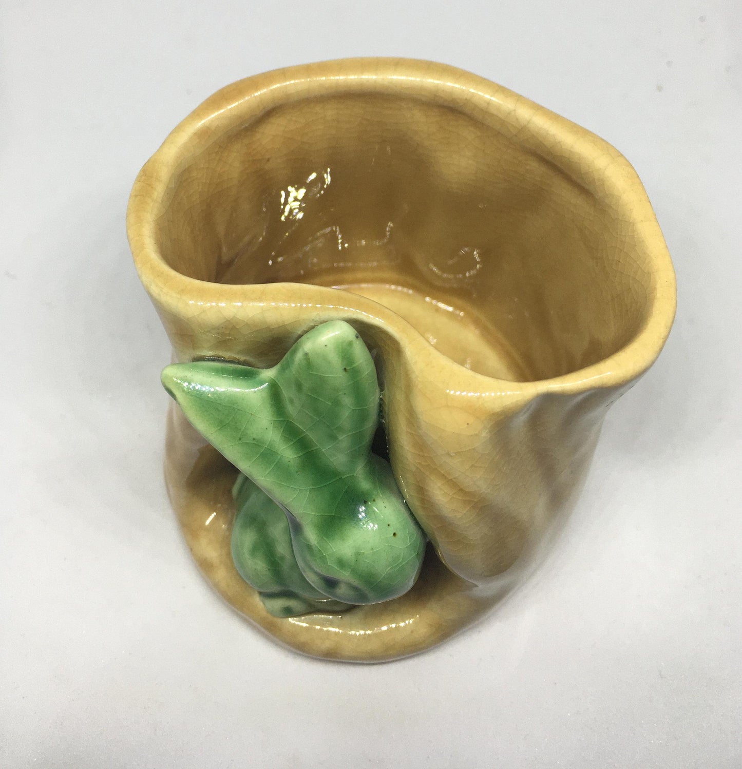 Campsie Ware green bunny by a tree stump planter vase.