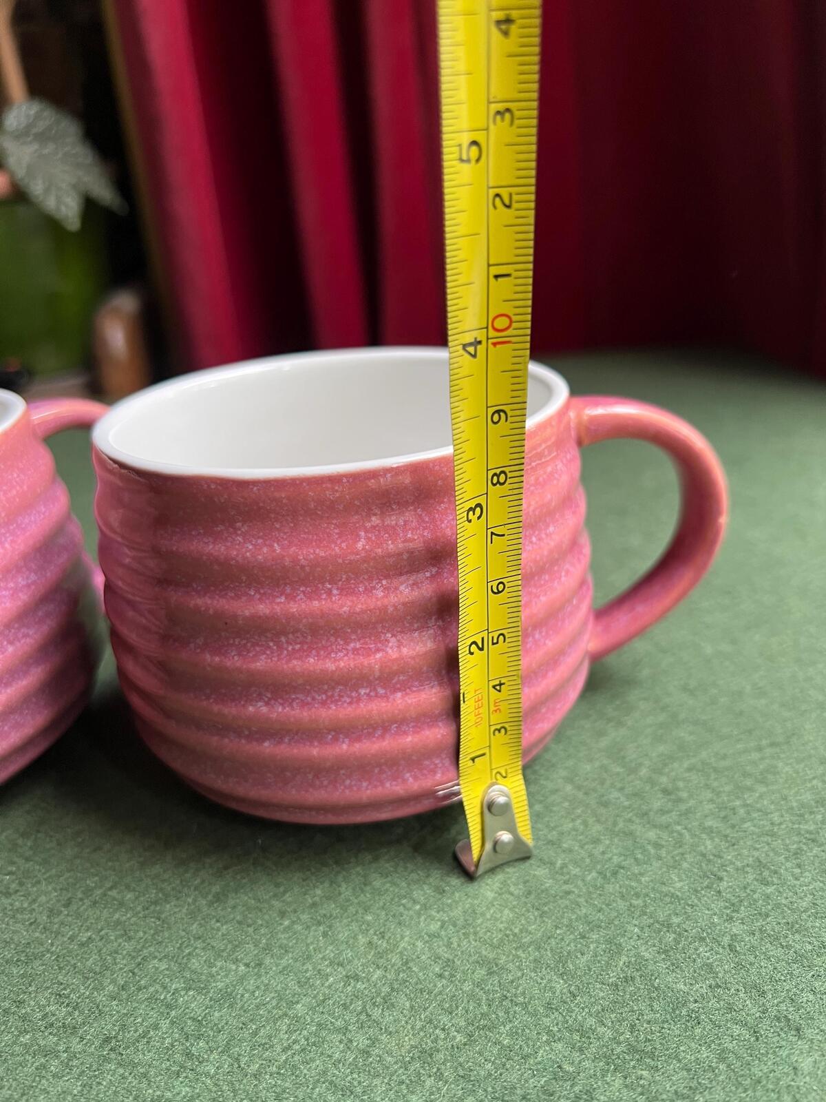 Pair of pink glaze coffee tea mugs. The Old Pottery Company,