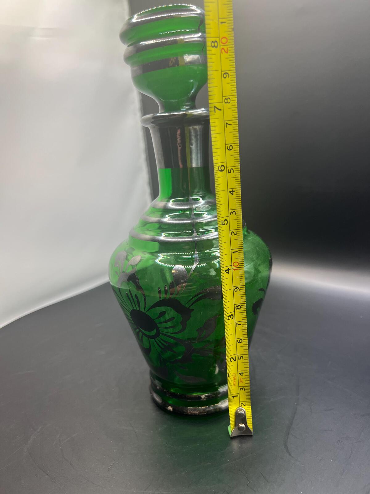 Antique Art Nouveau Emerald Green Glass Decanter with floral silver overlay and original stopper.