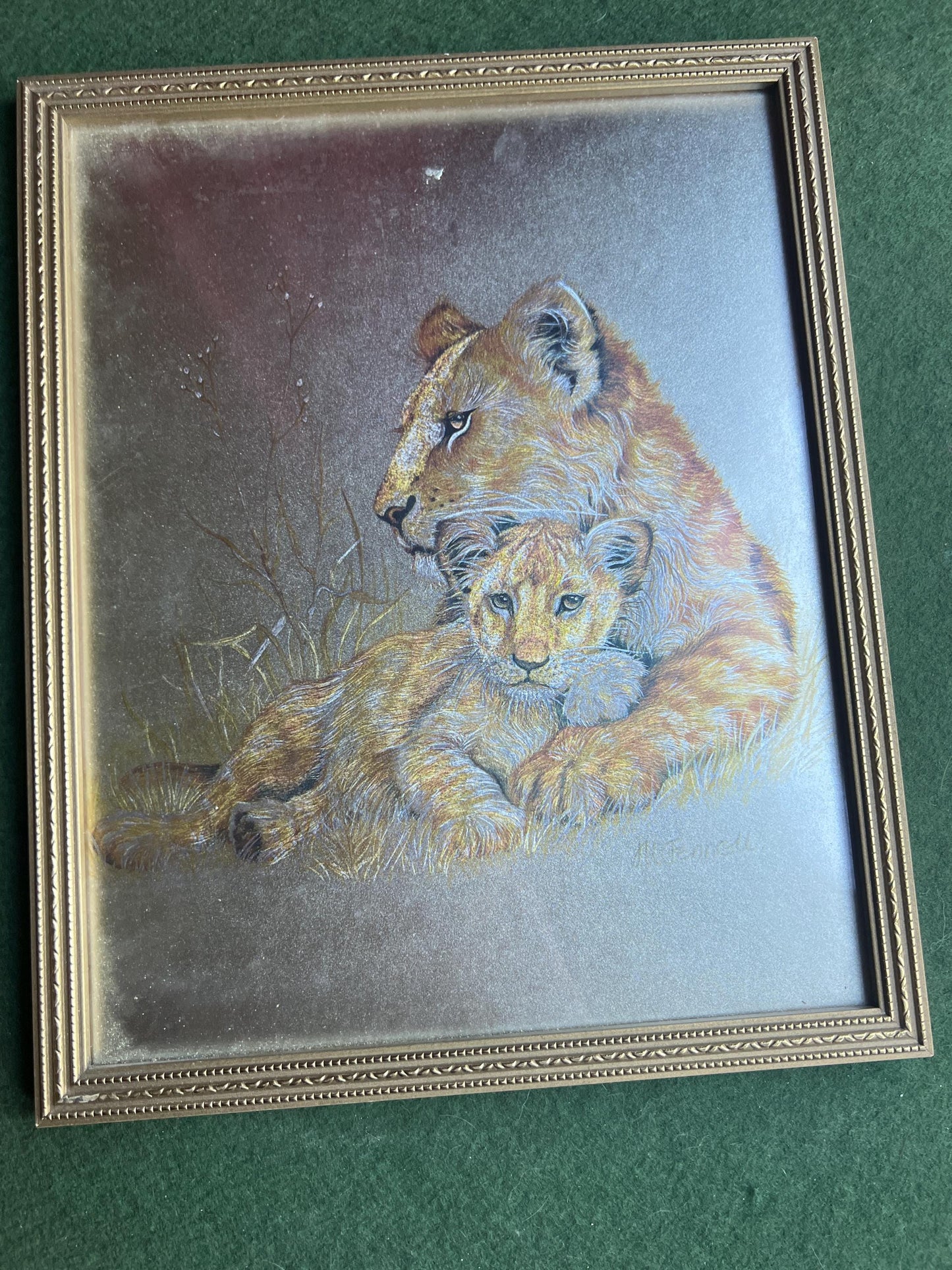 Lion and cub foil art framed picture. Signed M Fenelle