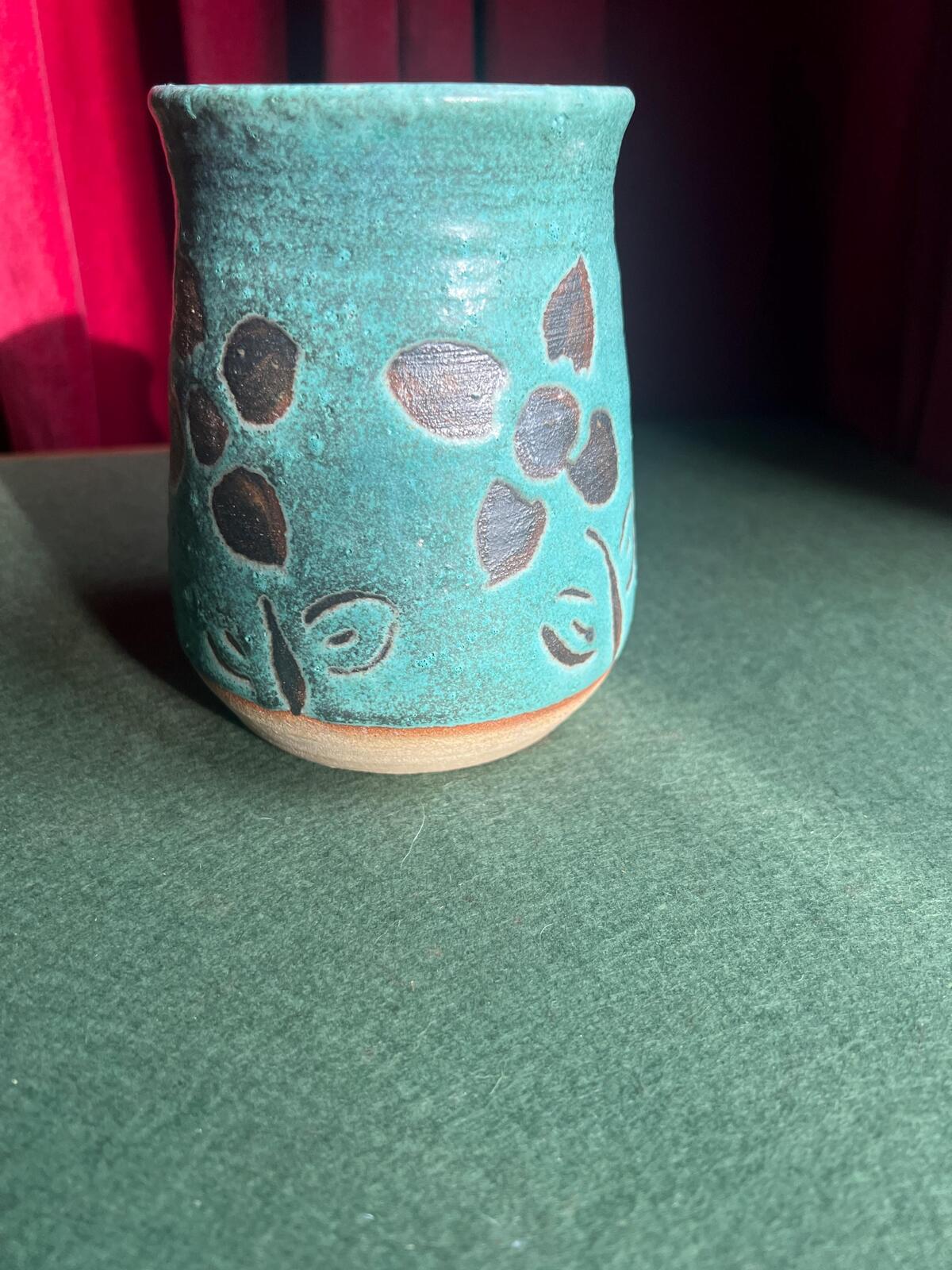 Studio Pottery Stoneware Vase Utensil holder. Floral design on blue textured glaze.