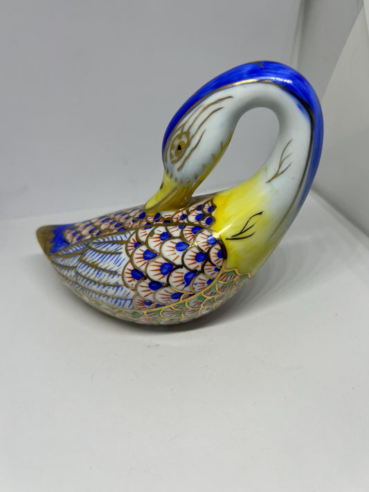 Decorative ceramic swan figurine. Stamped Fine Porcelain world symbol.