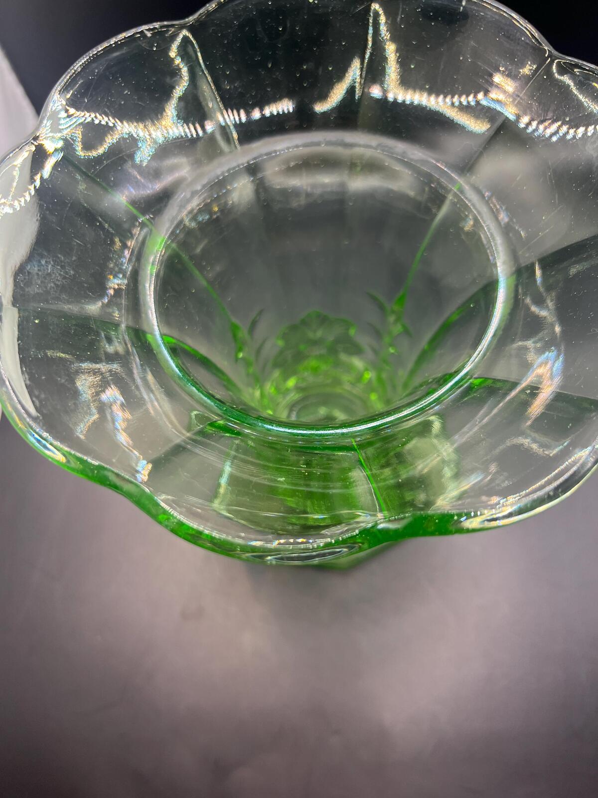 Vintage antique uranium glass vase. Octagonal base with flared ruffle rim and floral imprint.