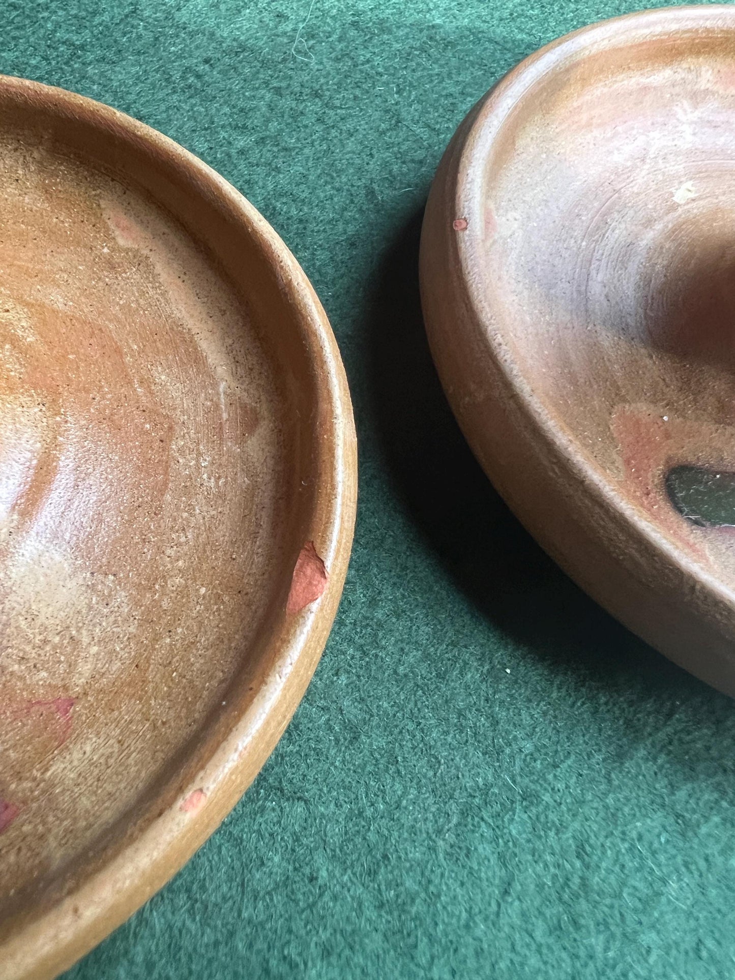 Pair of ceramic egg cups. Studio pottery brown glazed egg cups with integral saucers,