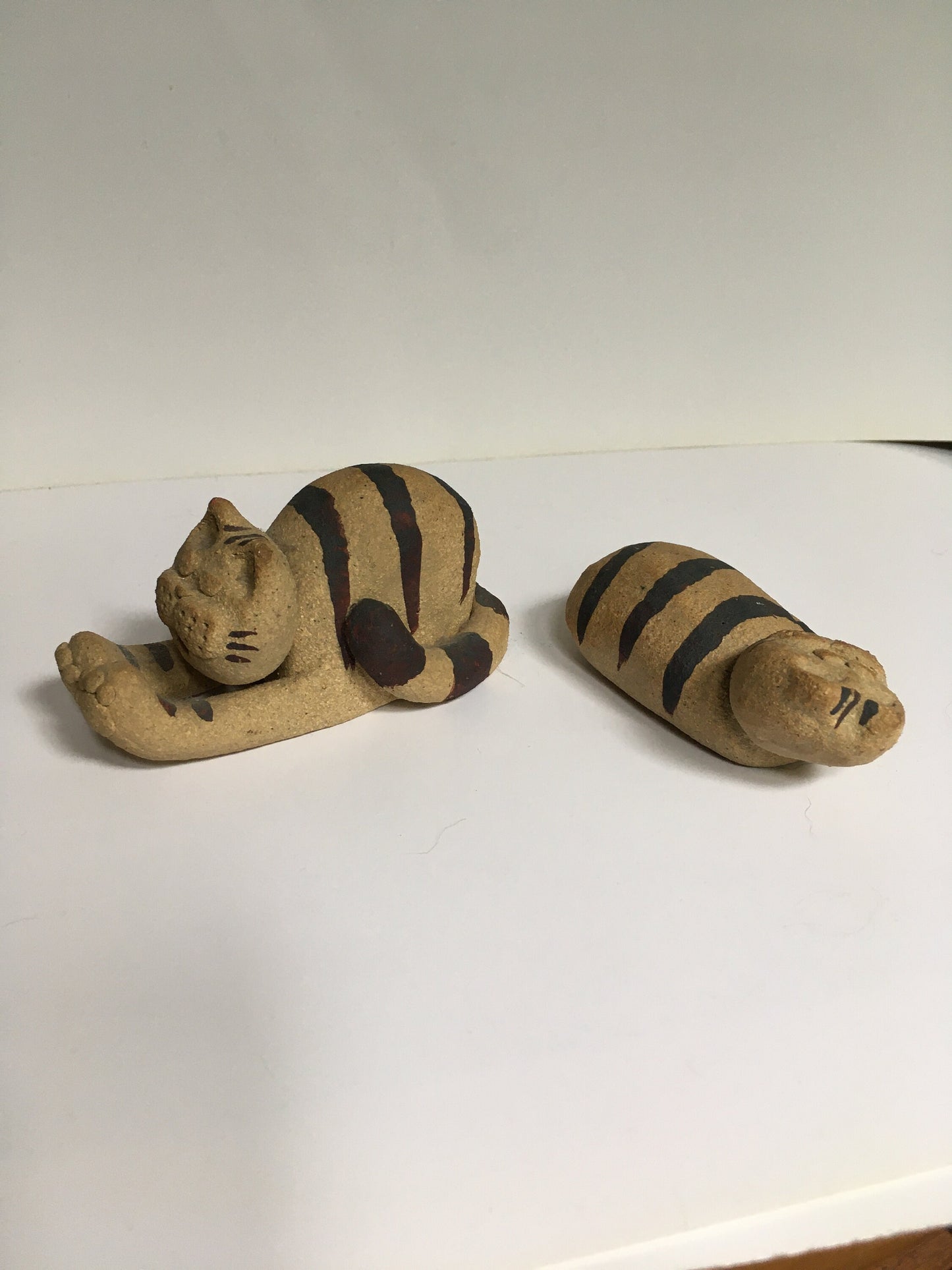 Cat figurines.