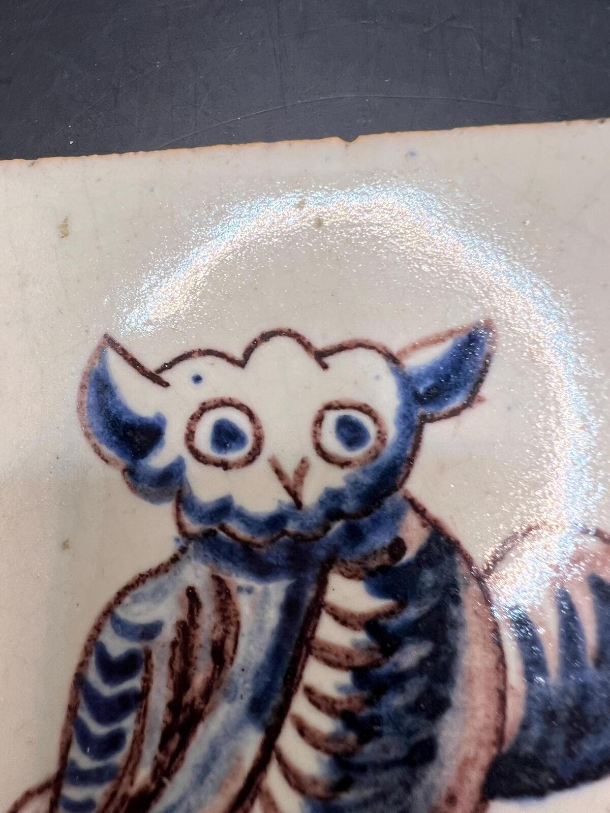 Antique Dutch Delft polychrome tile. Hand-painted owl with foliage.