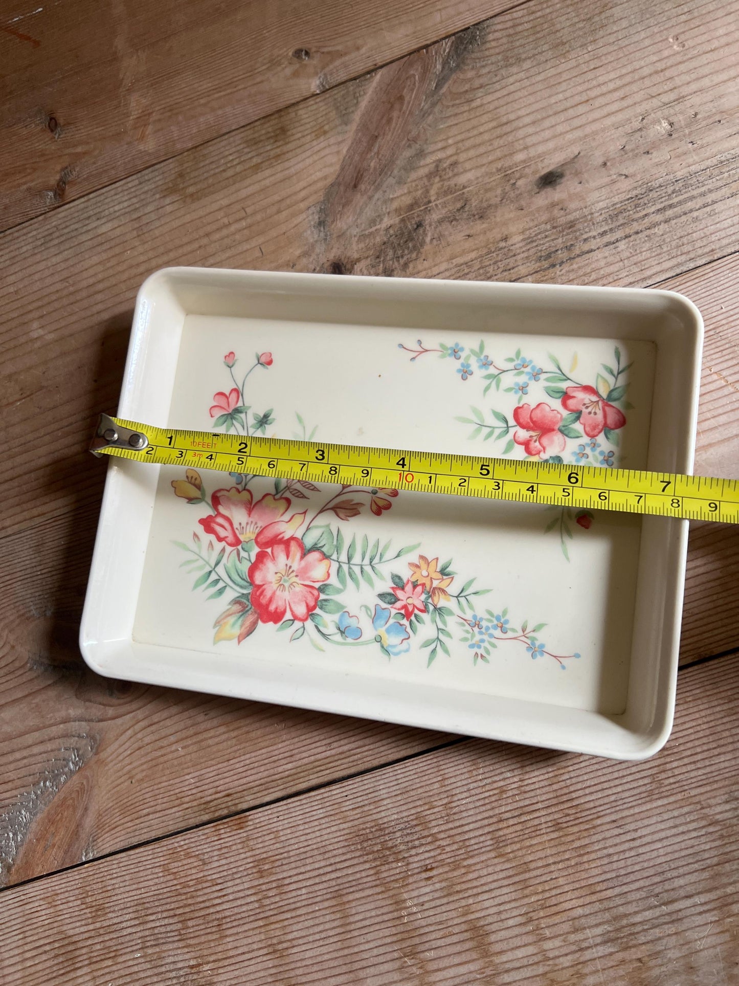 White Melamine key tray with pink yellow flowers. Stamped Melamaster GB.
