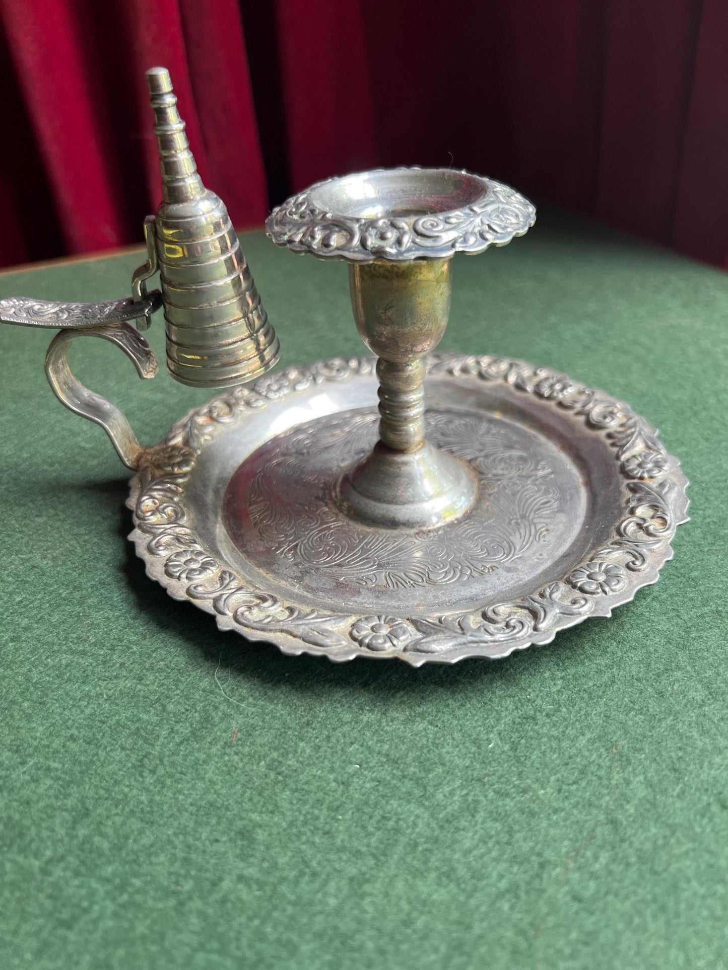 Vintage silver tone candle holder with snuffer.
