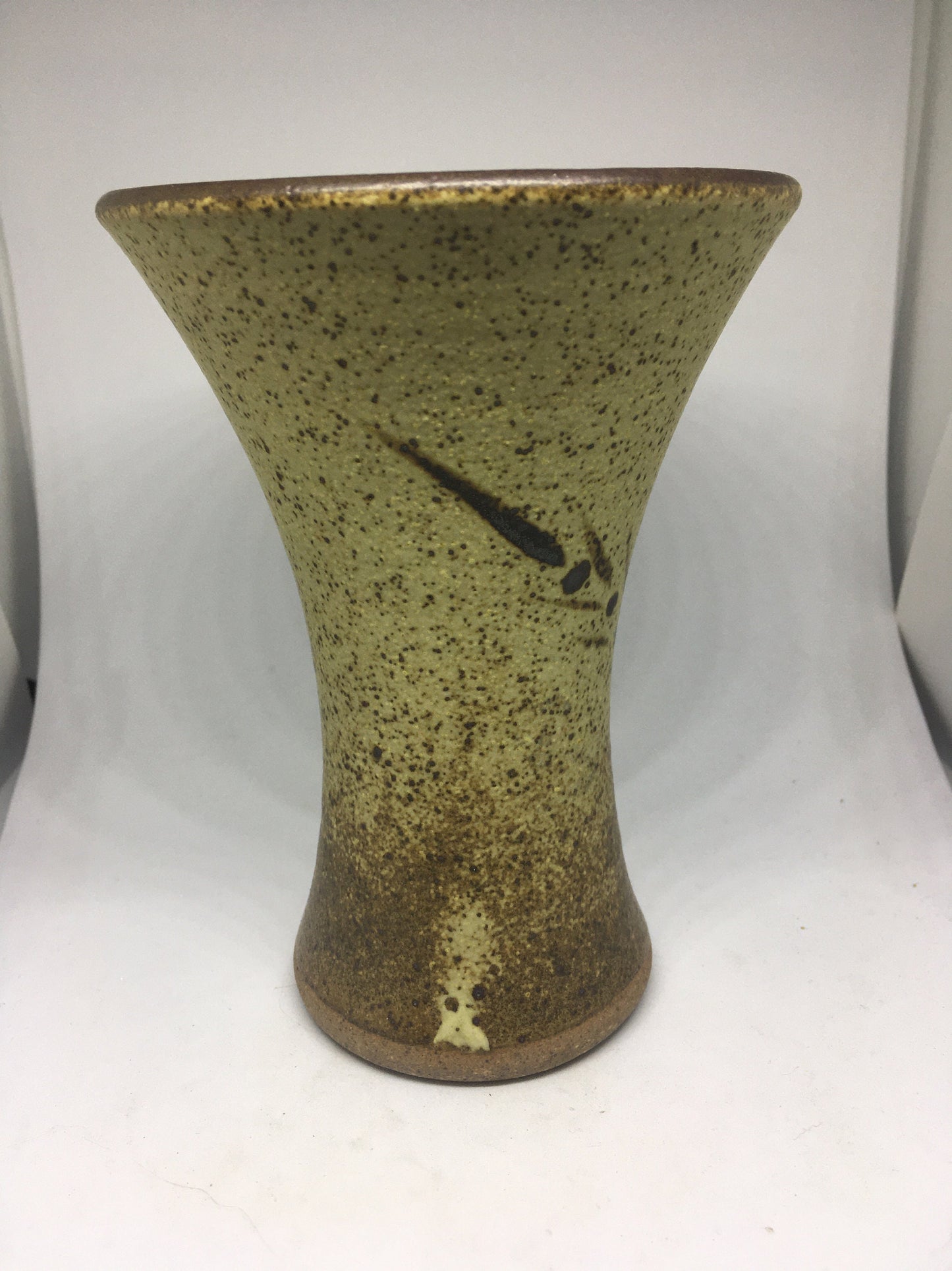 Vintage stoneware trumpet vase with abstract design. Speckle glazed mid century flower display vase.
