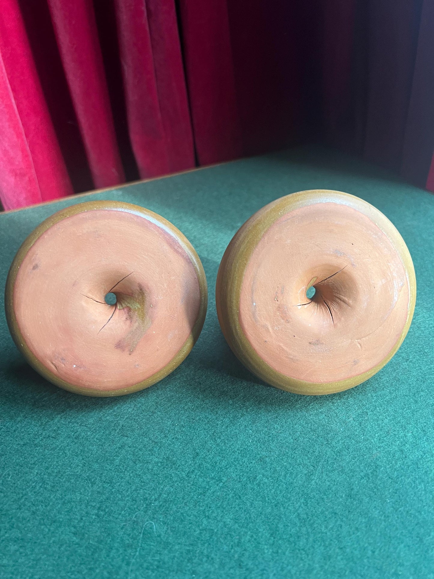 Pair of ceramic egg cups. Studio pottery brown glazed egg cups with integral saucers,