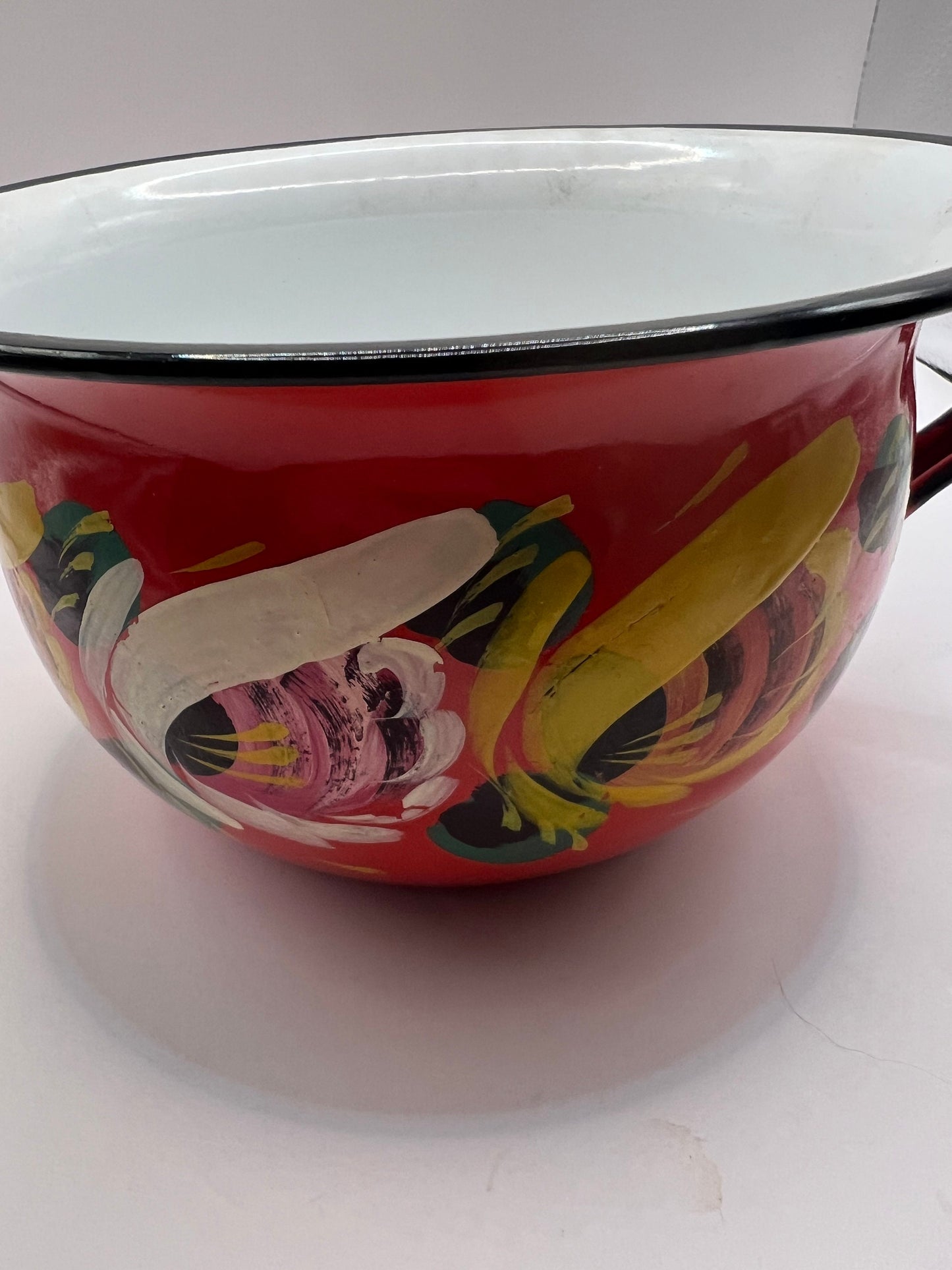 Polish enamelware chamber pot planter.