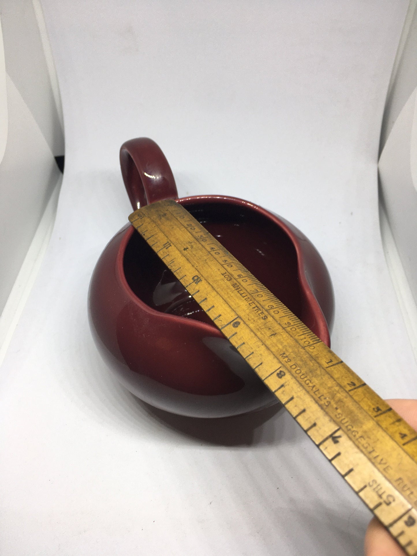 Rare vintage deep red Poole Pottery milk jug creamer sauce boat.