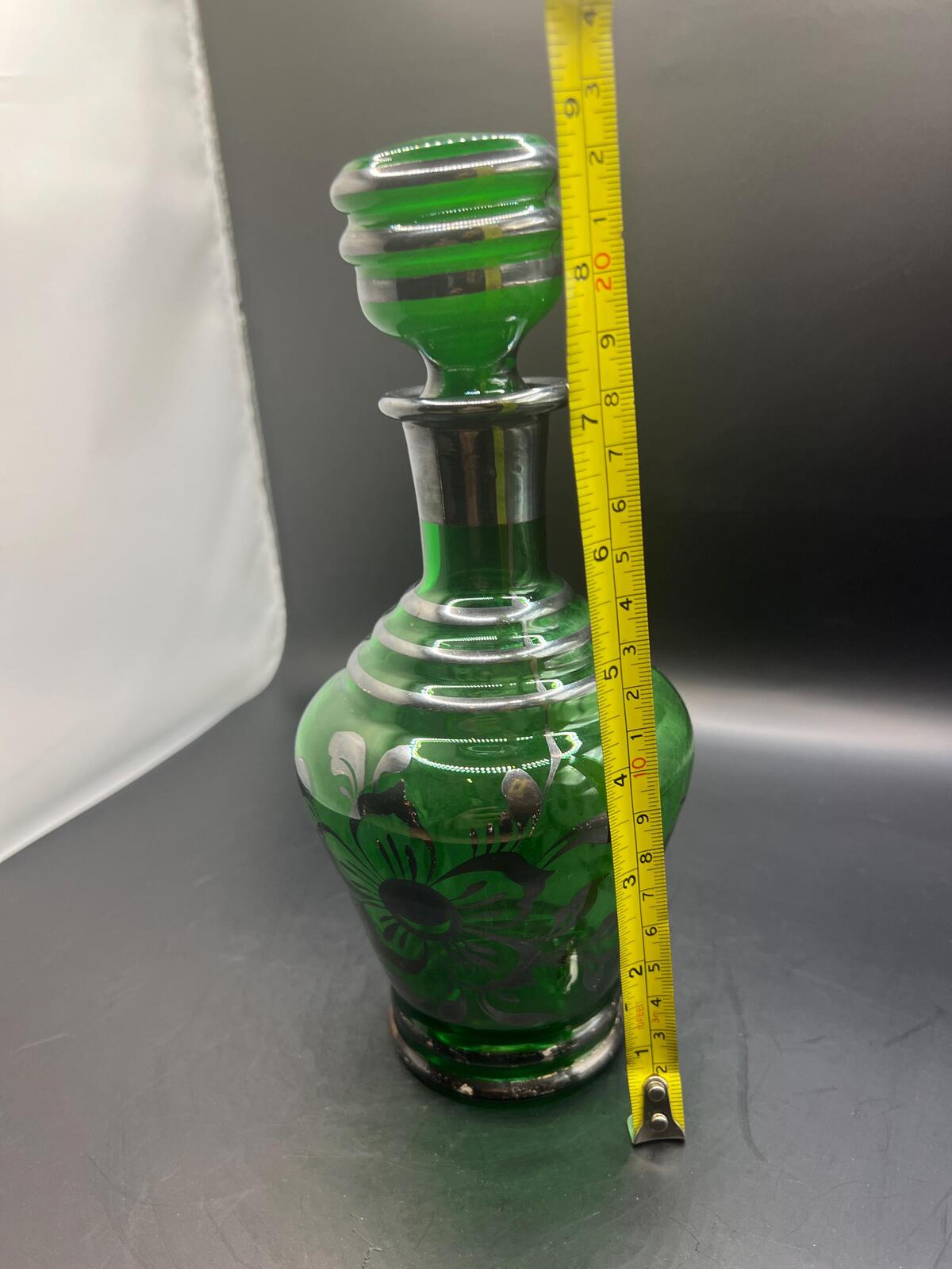 Antique Art Nouveau Emerald Green Glass Decanter with floral silver overlay and original stopper.