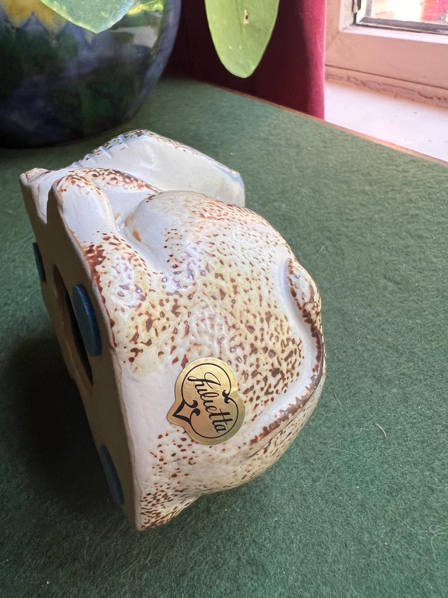 Stylised stone ware lion planter with original 'Julietta' Sticker.
