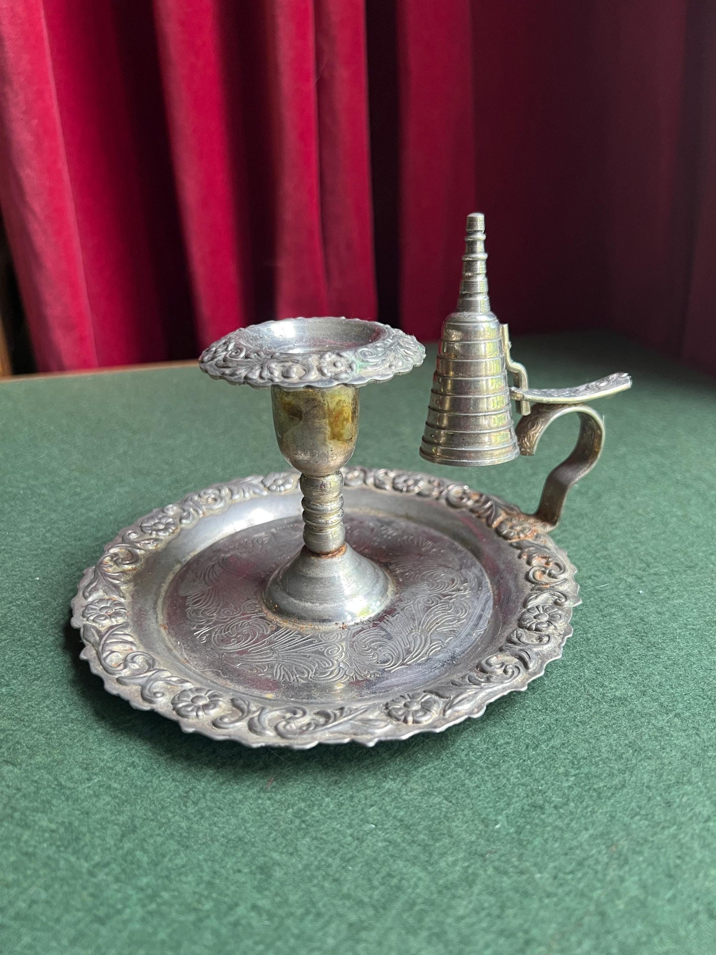 Vintage silver tone candle holder with snuffer.