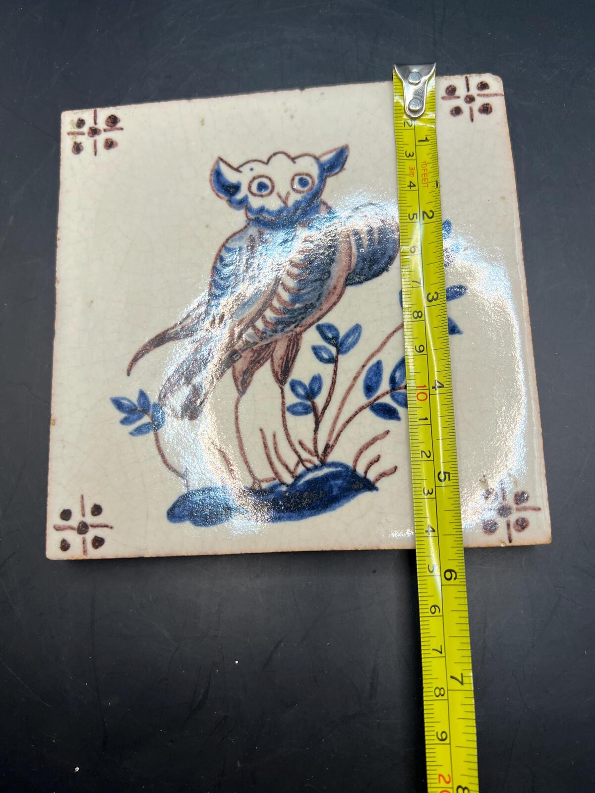 Antique Dutch Delft polychrome tile. Hand-painted owl with foliage.