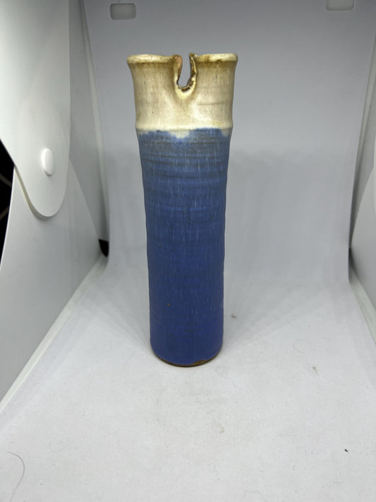Quirky studio pottery bud vase with blue white glaze.