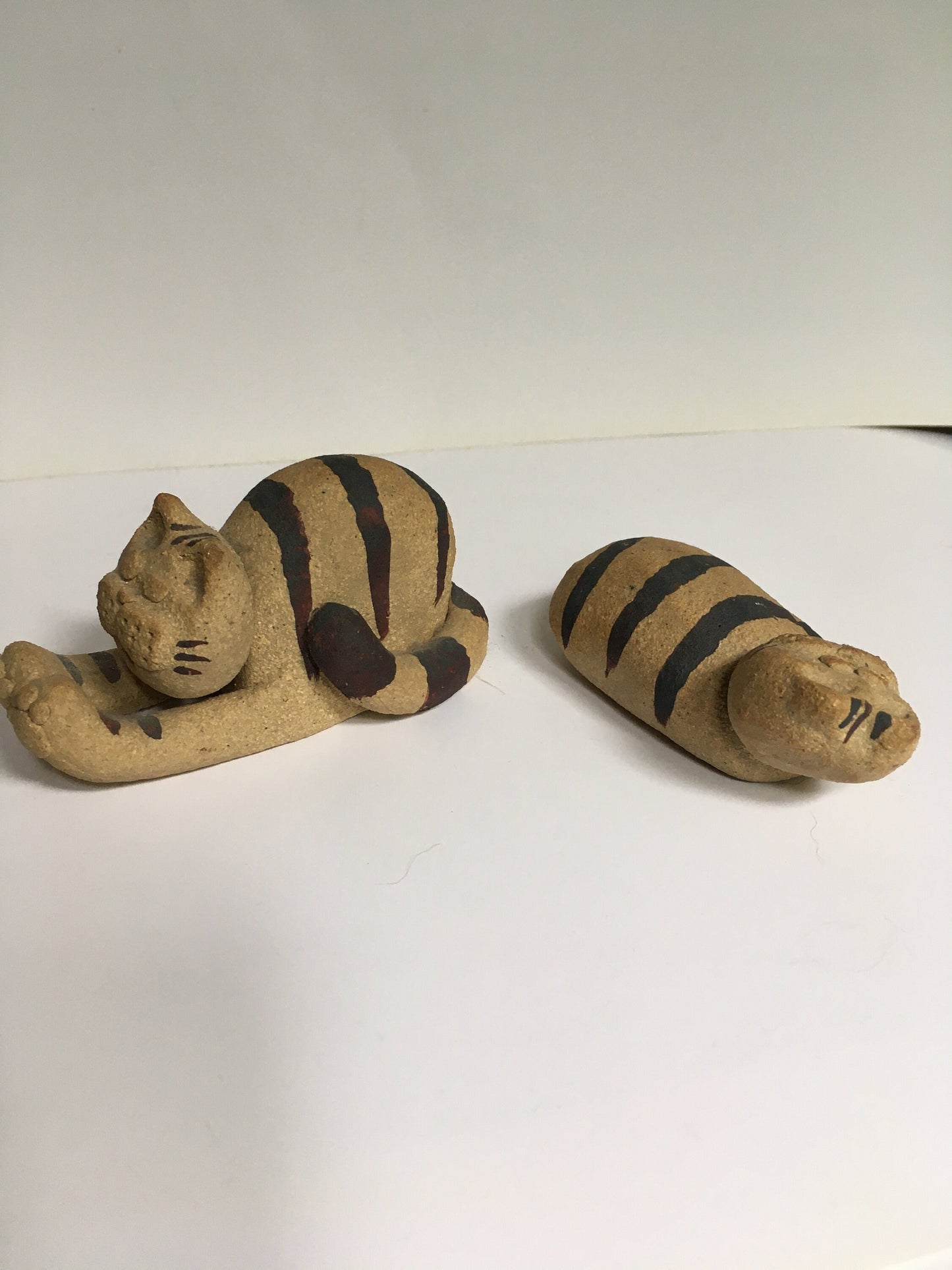 Cat figurines.