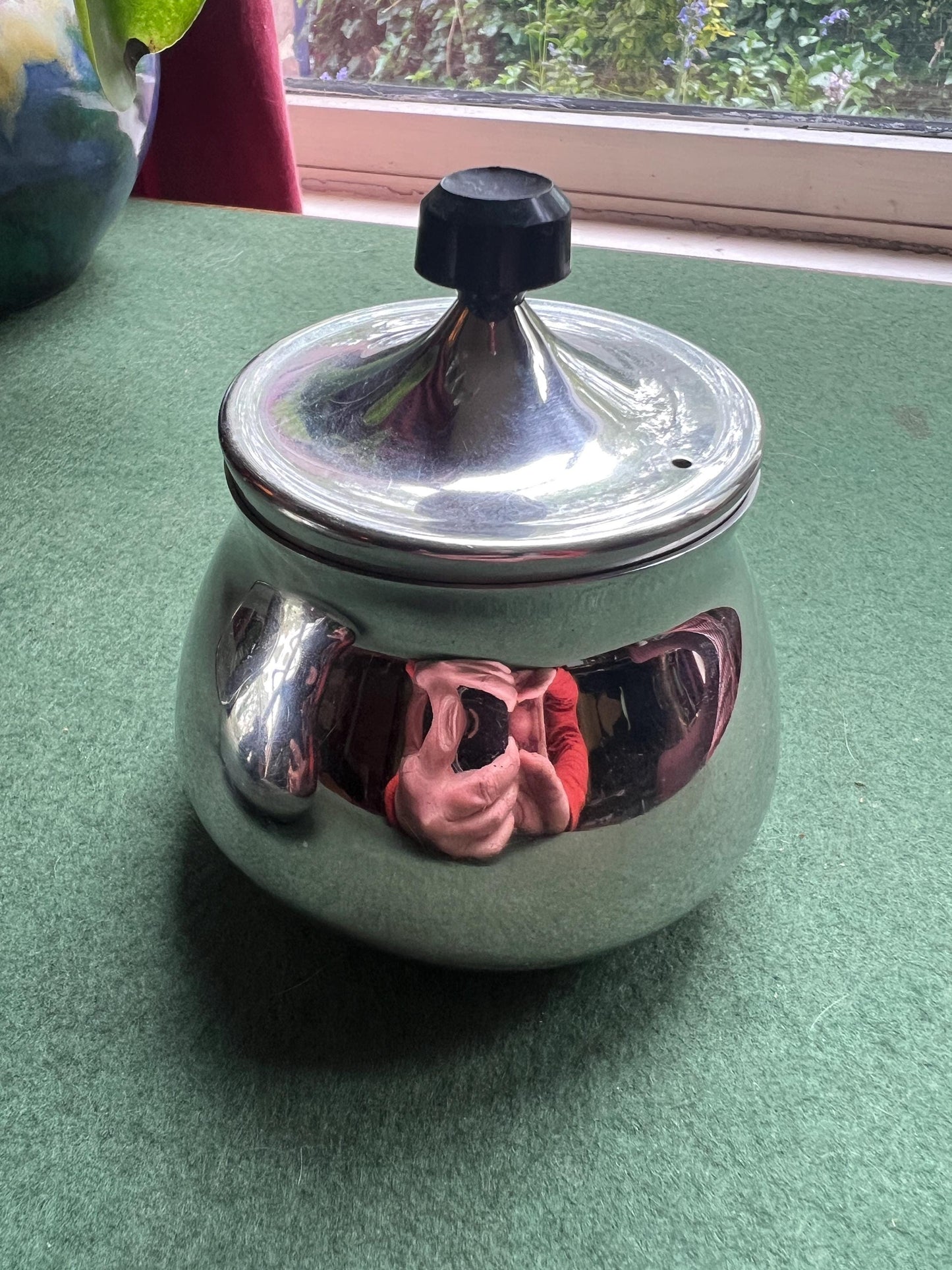 Stainless Steele lidded sugar bowl and creamer. Stamped Bramah of Sheffield Made in England.
