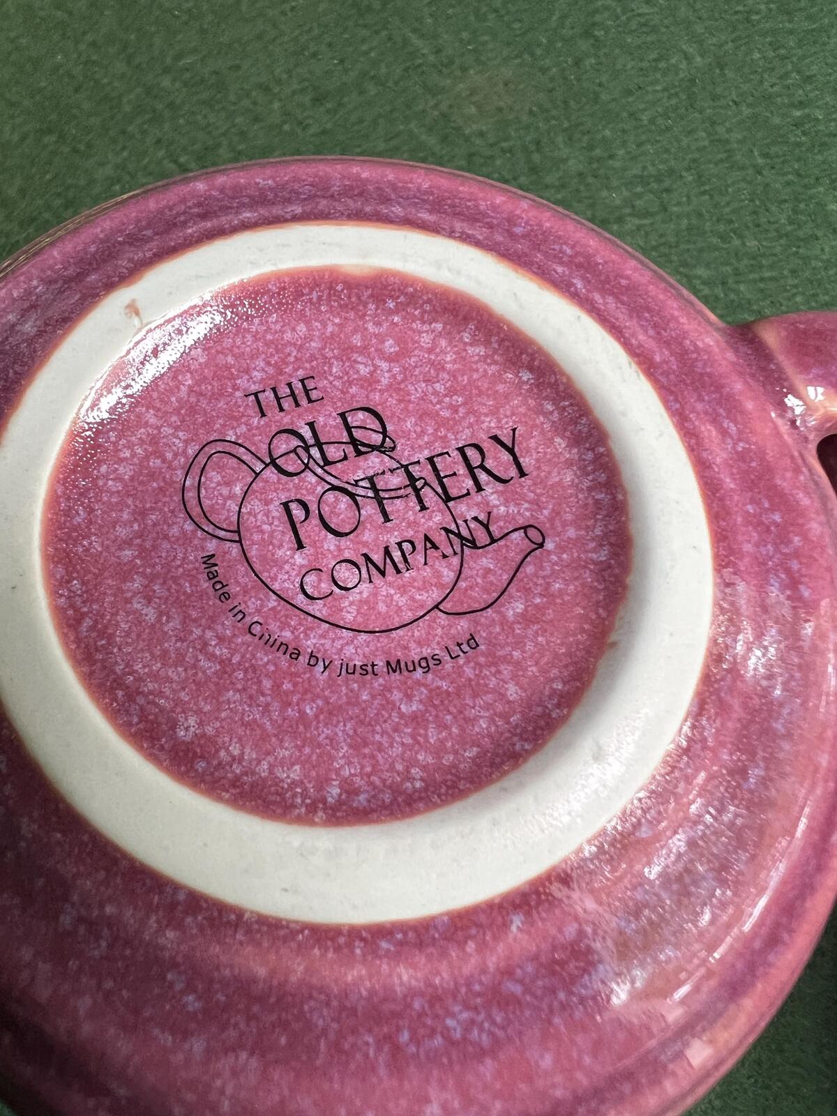 Pair of pink glaze coffee tea mugs. The Old Pottery Company,