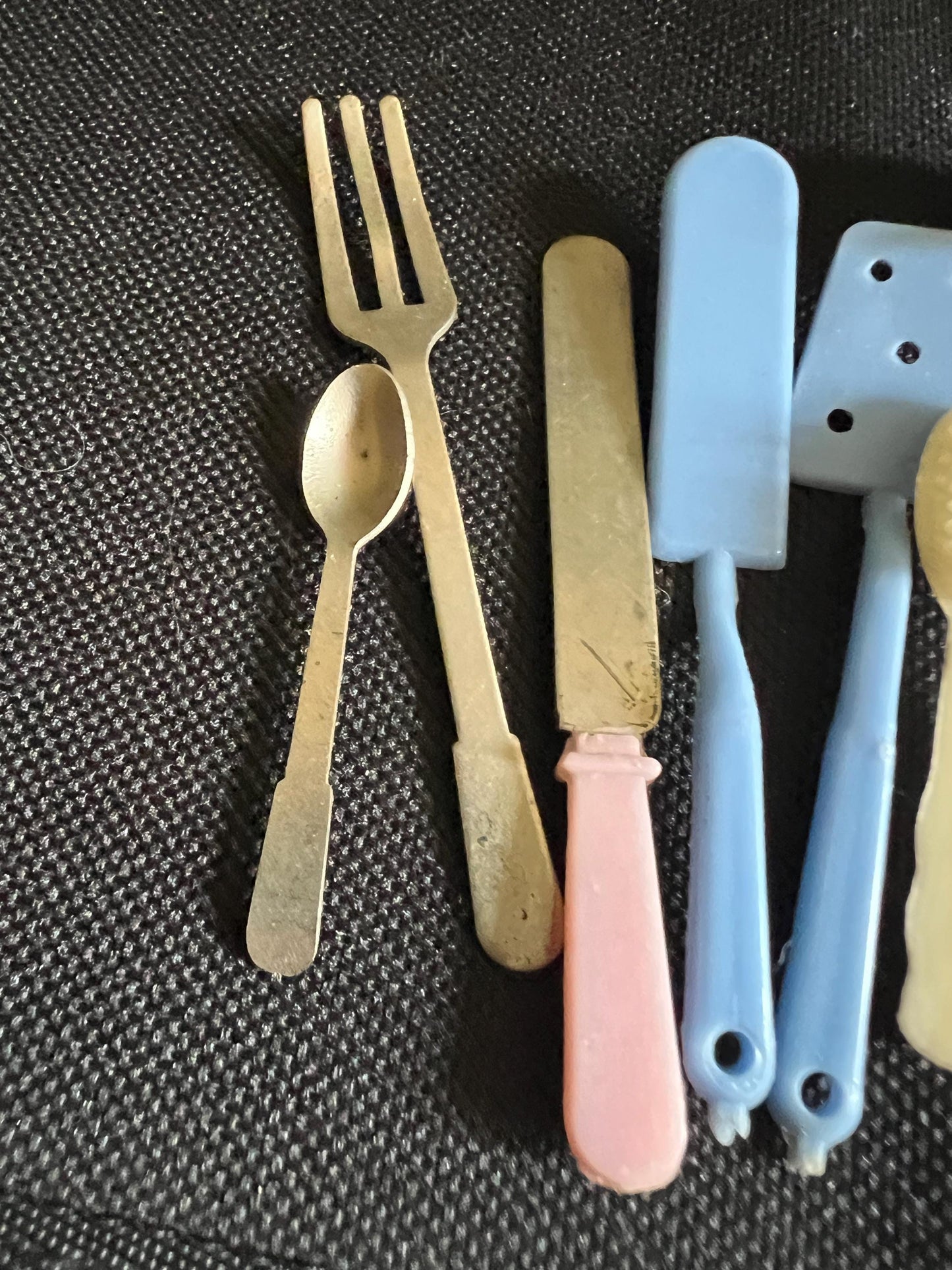 Dolls house miniature plastic cutlery plates, serving utensils.