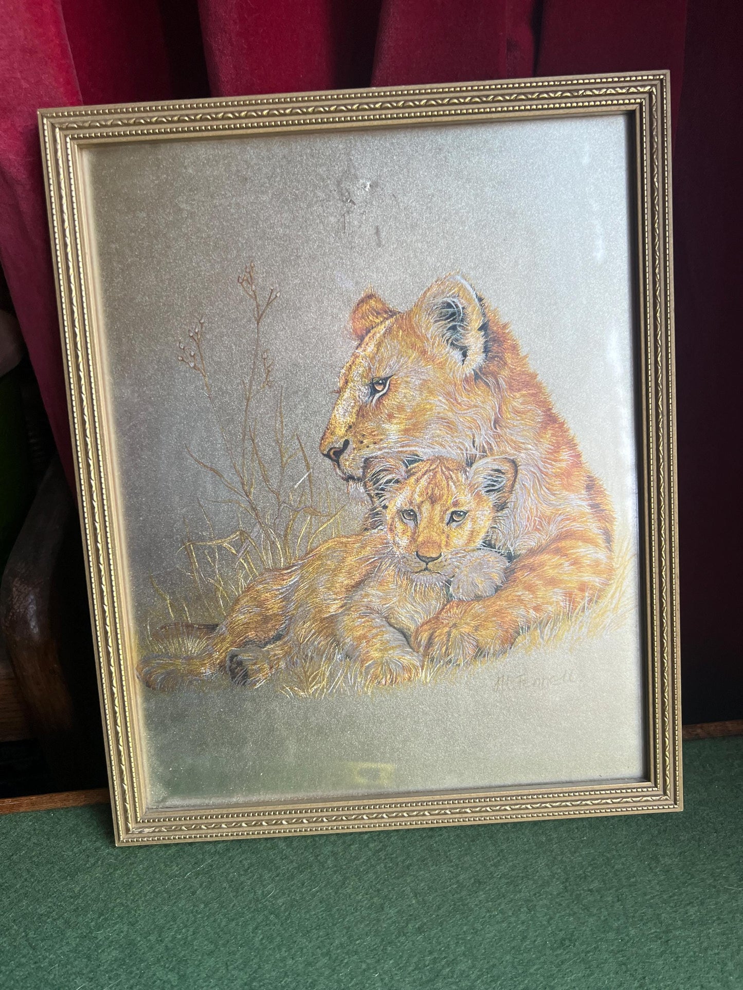 Lion and cub foil art framed picture. Signed M Fenelle