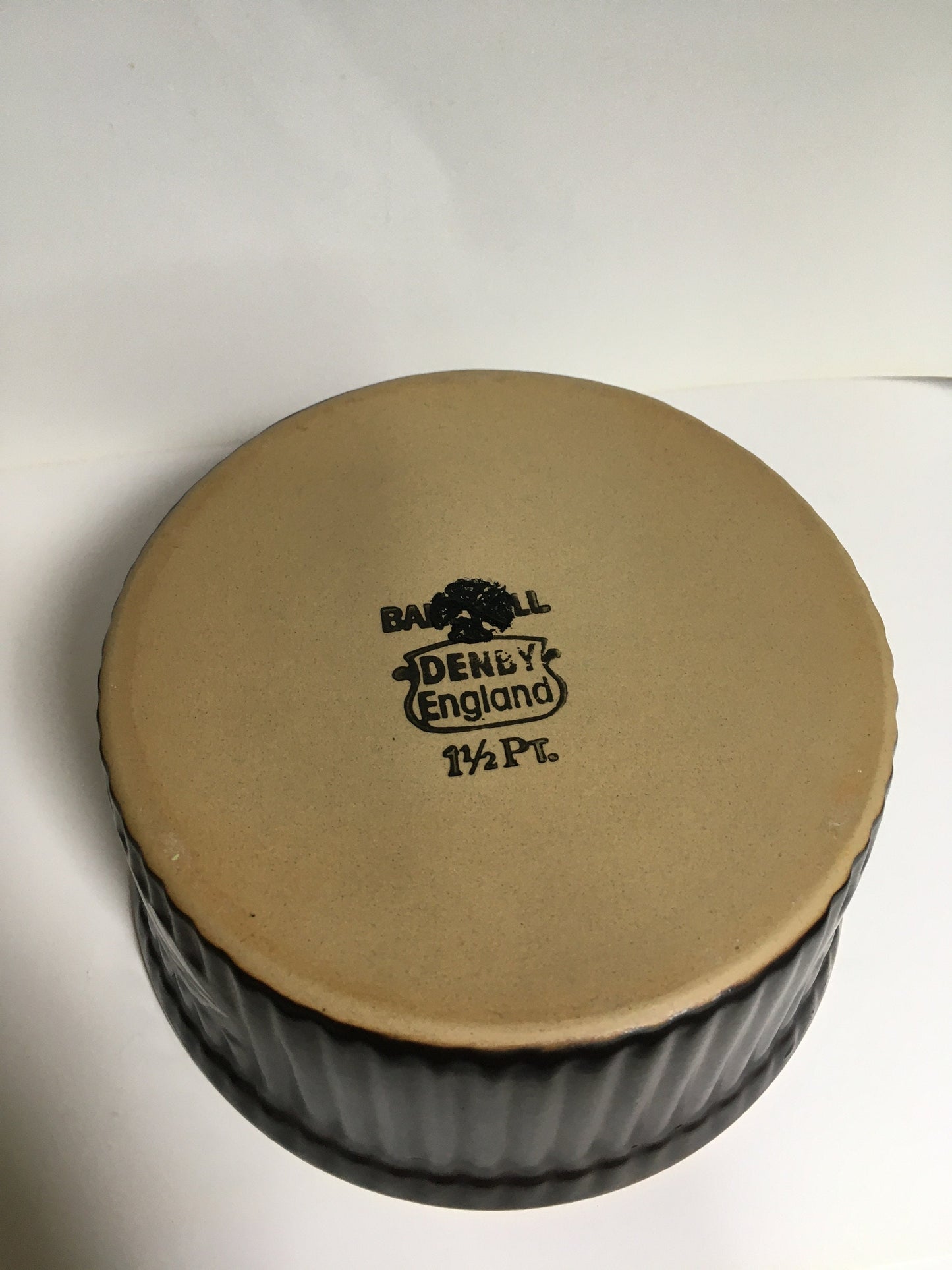 Vintage Denby Deep Pie dish casserole. Brown glazed stone ware with Daisy pattern. Stamped 1 1/2 pints Bakewell England.