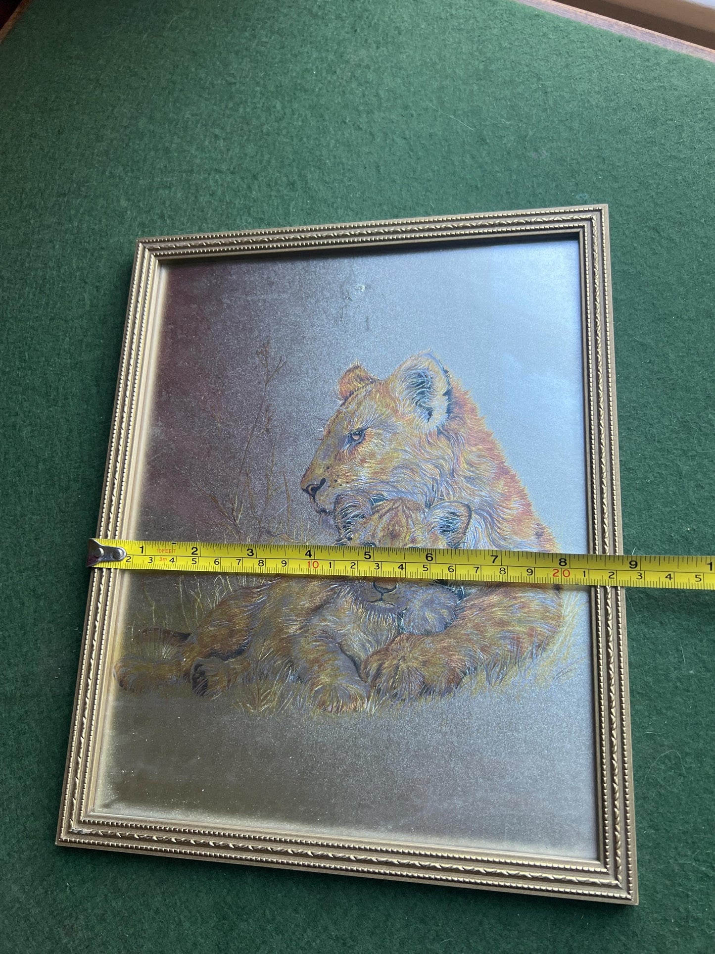 Lion and cub foil art framed picture. Signed M Fenelle